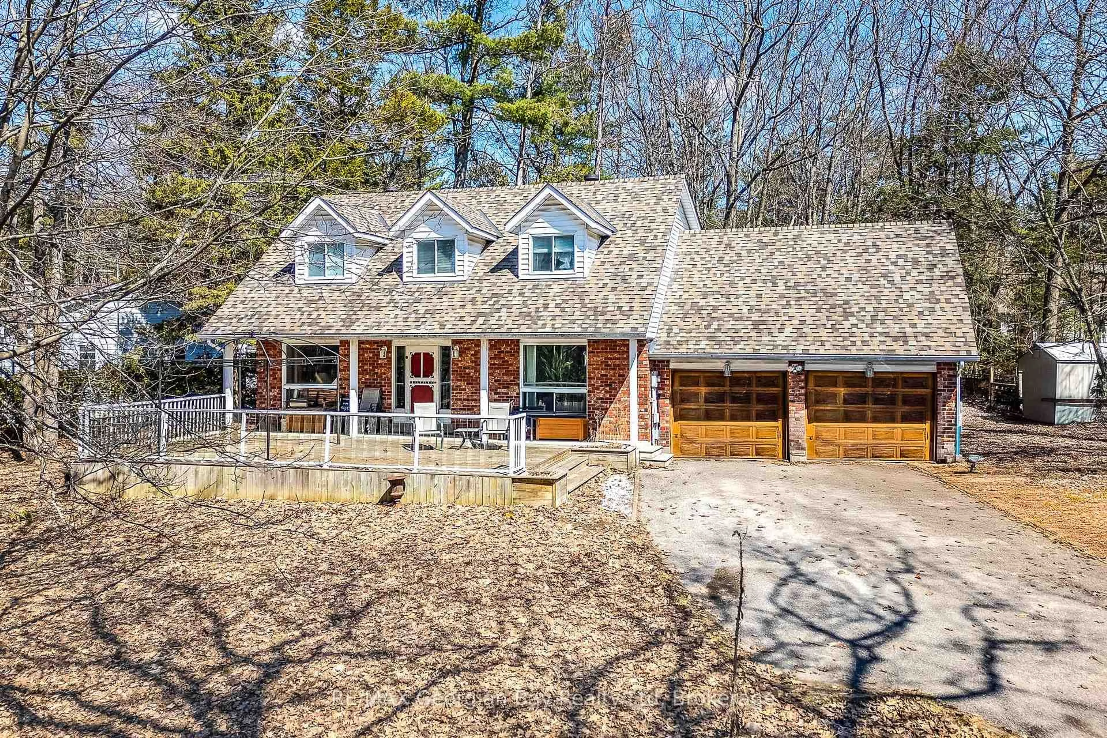 A pic from outside/outdoor area/front of a property/back of a property/a pic from drone, street for 225 Tiny Beaches Rd, Tiny Ontario L0L 2J0