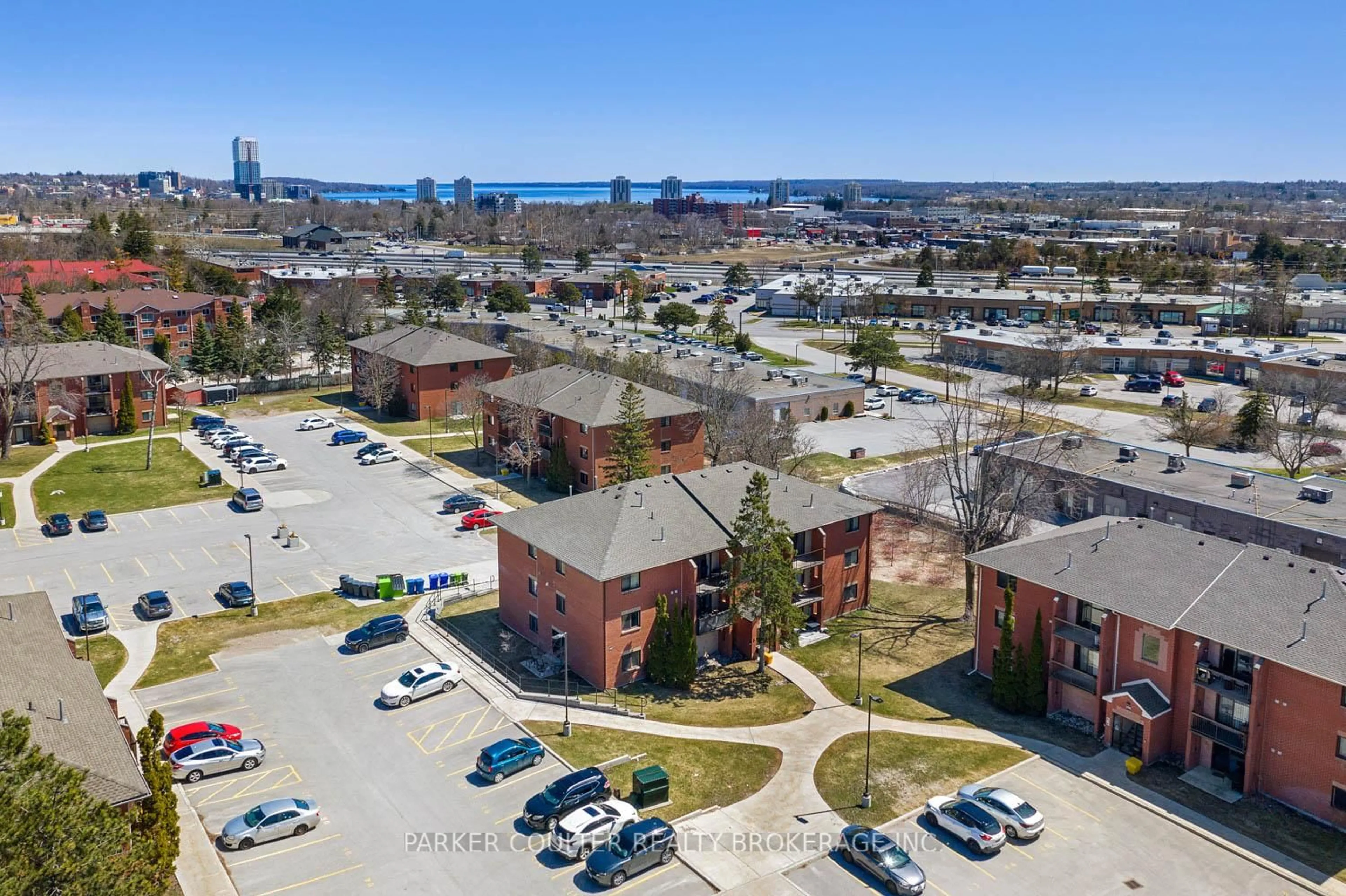 A pic from outside/outdoor area/front of a property/back of a property/a pic from drone, city buildings view from balcony for 167 Edgehill Dr #E5, Barrie Ontario L4N 1L9