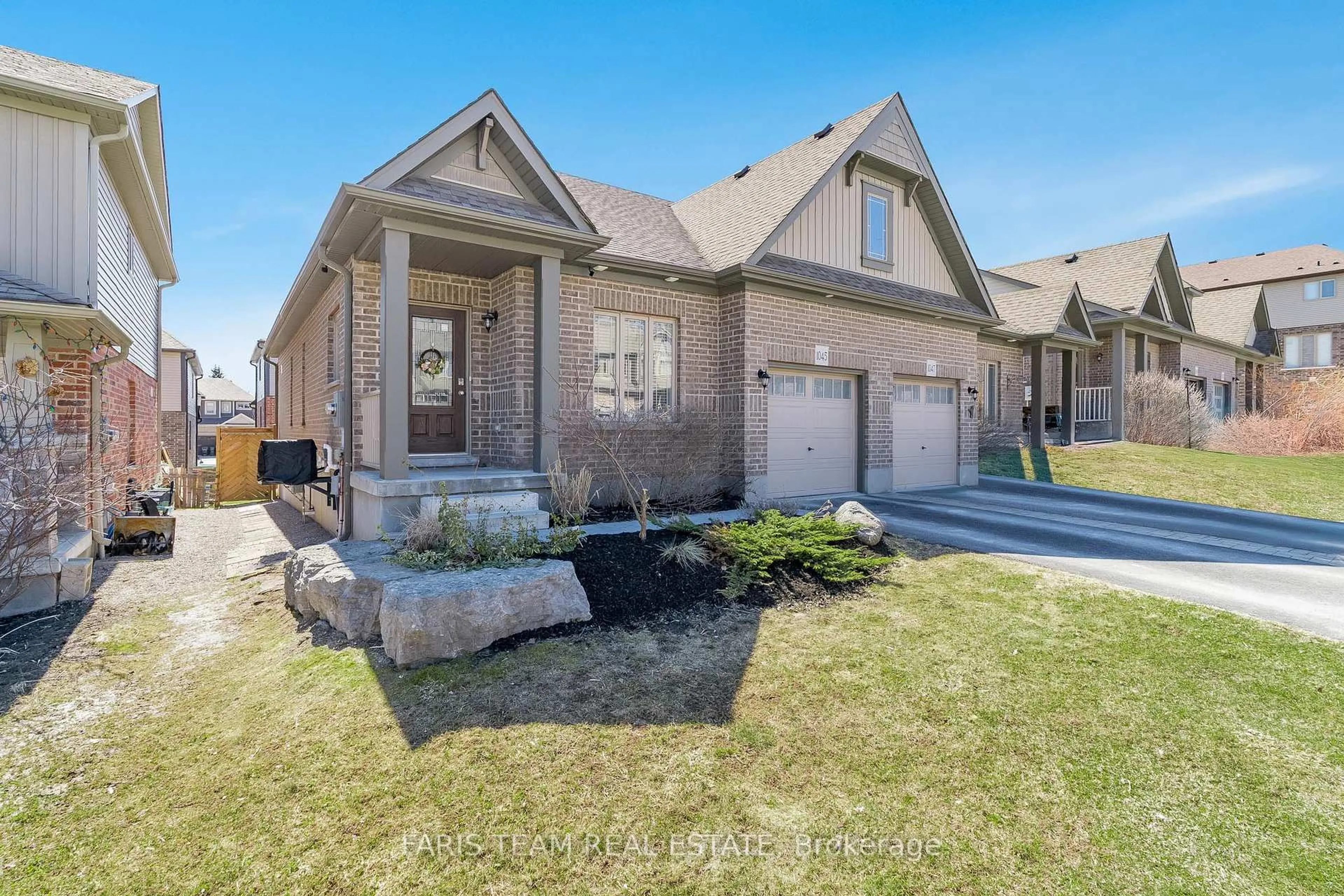 Home with brick exterior material, street for 1045 Cook Dr, Midland Ontario L4R 0E4