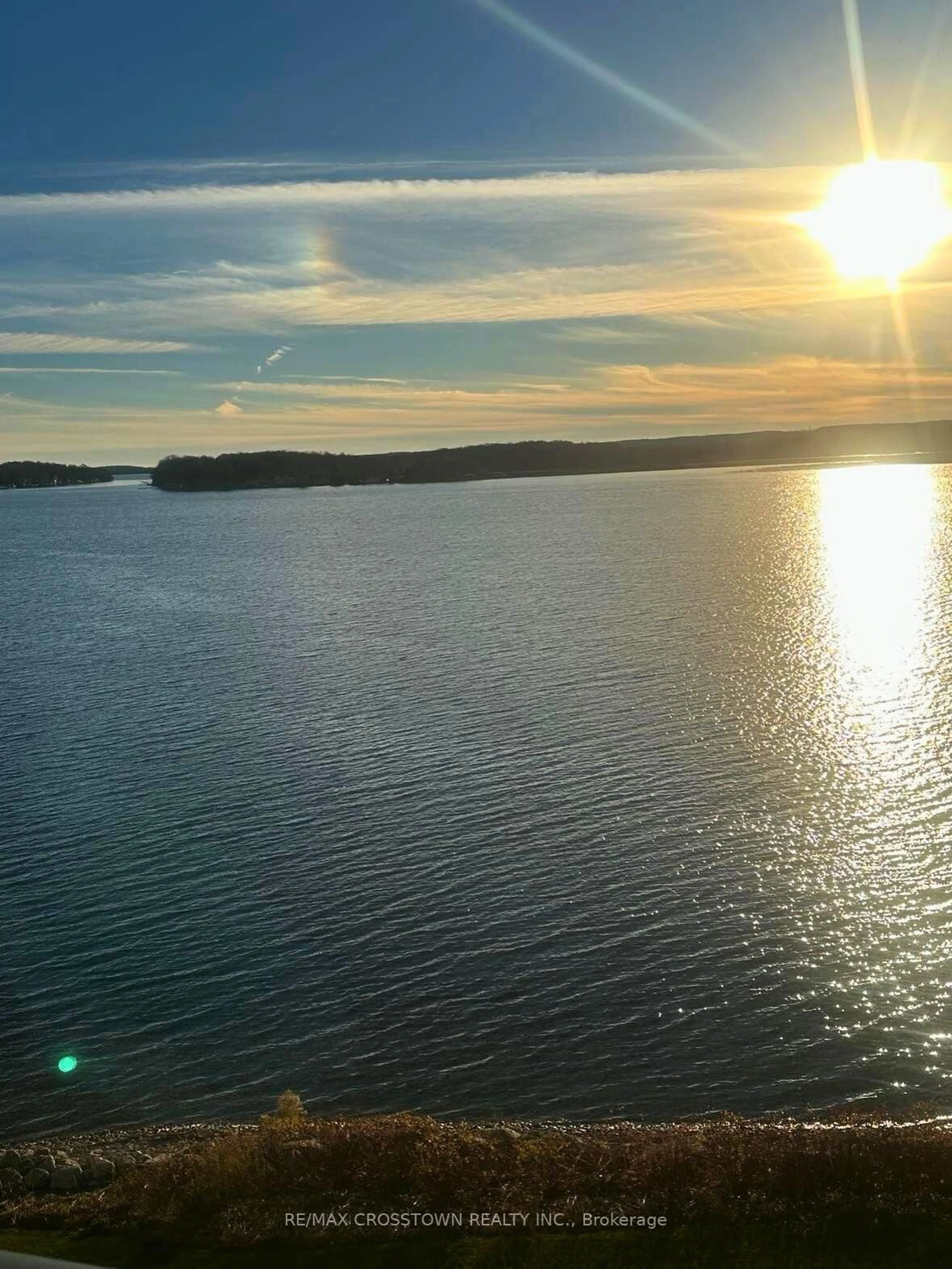 A pic from outside/outdoor area/front of a property/back of a property/a pic from drone, water/lake/river/ocean view for 90 Orchard Point Rd #401, Orillia Ontario L3V 1C3