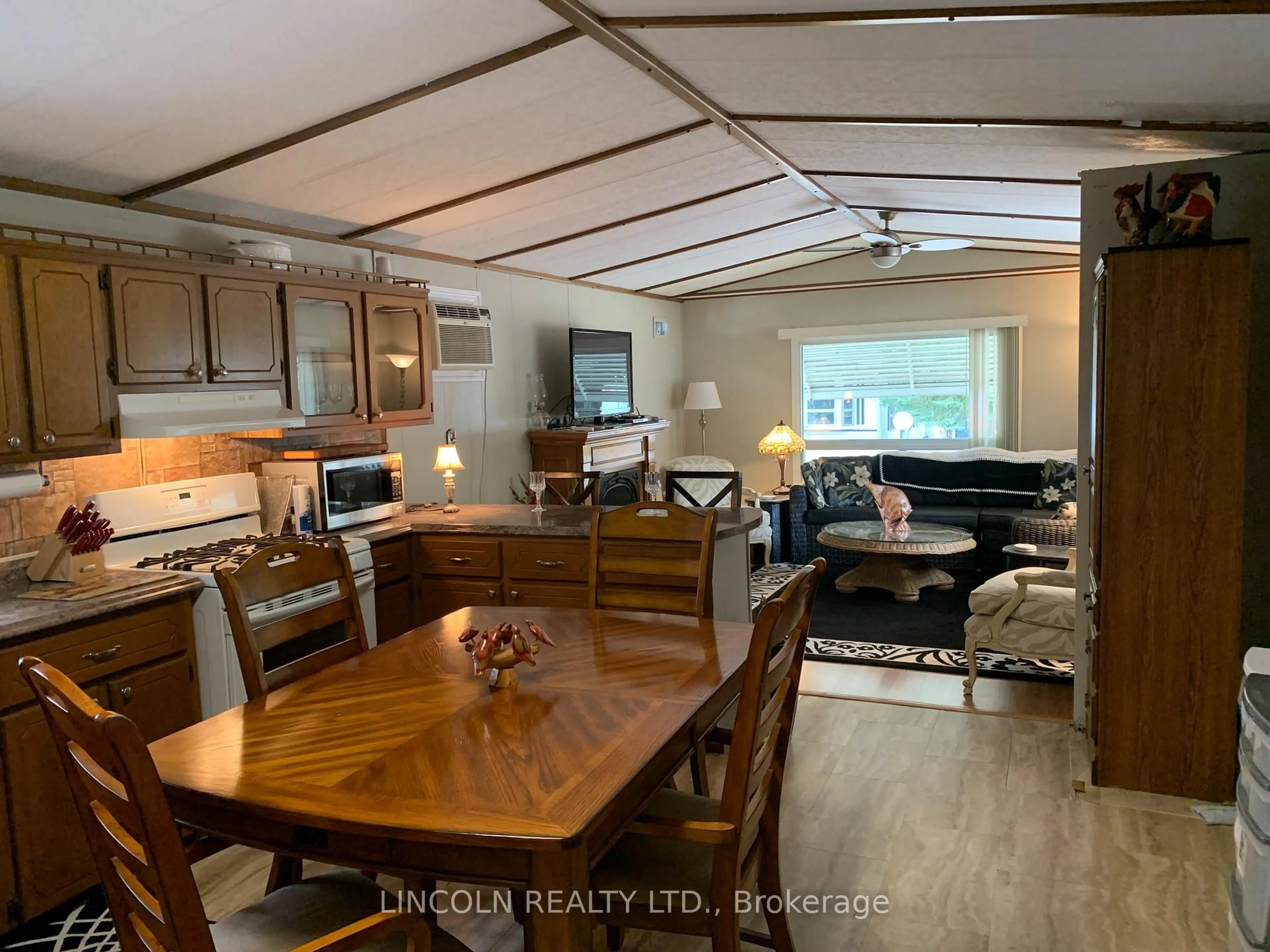Open concept kitchen, wood/laminate floor for 5216 County Road 90 N/A #47, Springwater Ontario L0L 1T0