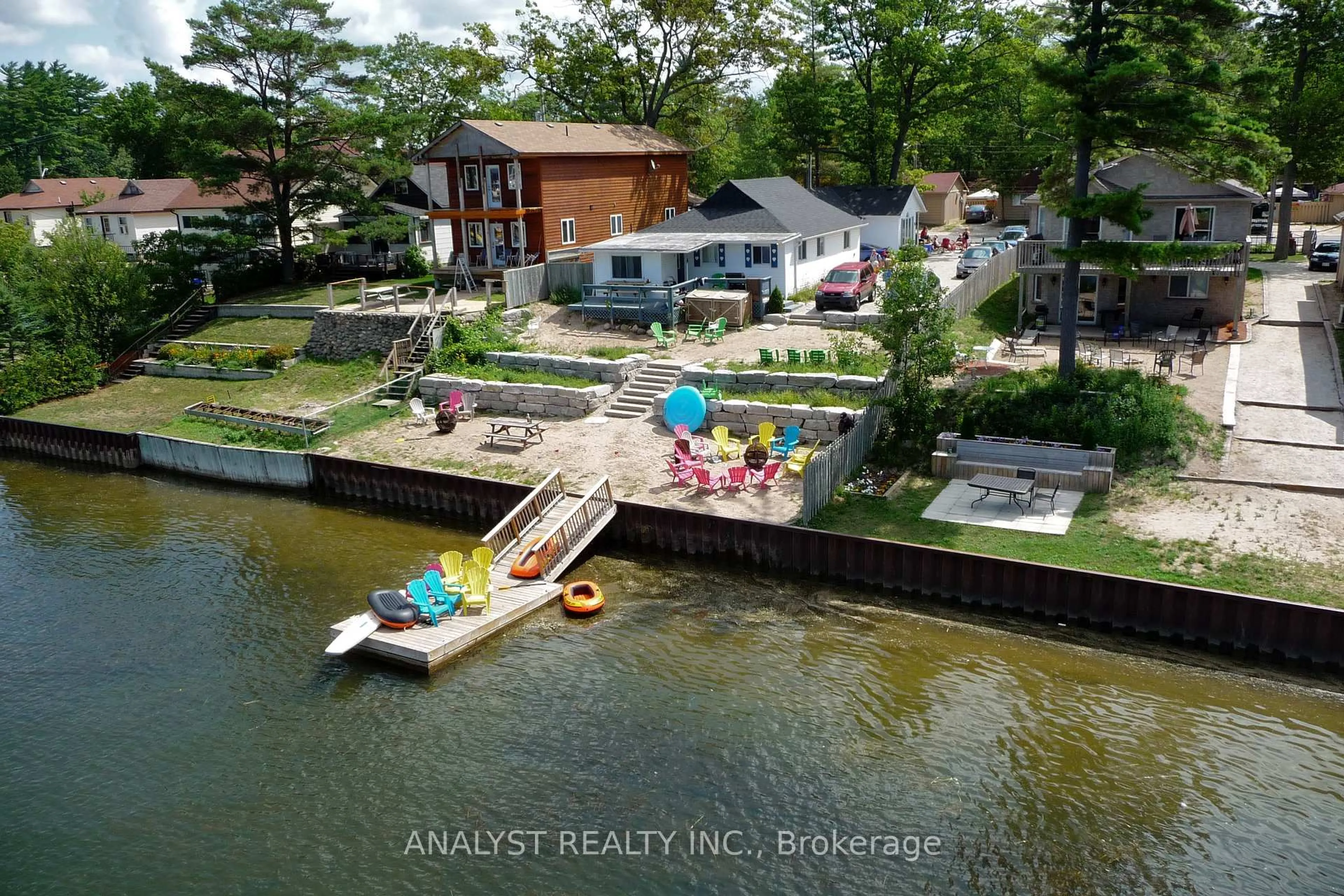 A pic from outside/outdoor area/front of a property/back of a property/a pic from drone, water/lake/river/ocean view for 28 River Avenue Cres, Wasaga Beach Ontario L9Z 2K6