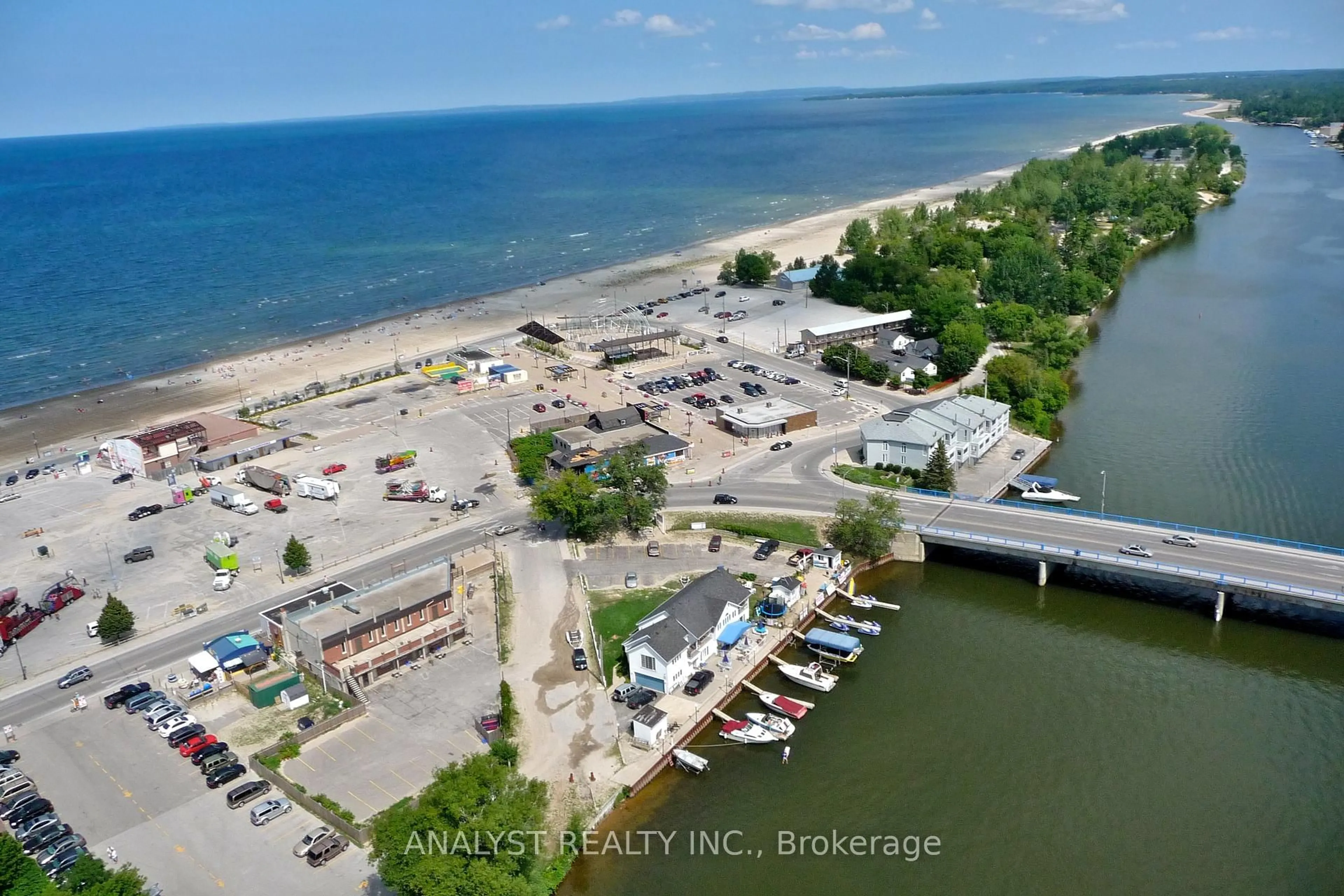 A pic from outside/outdoor area/front of a property/back of a property/a pic from drone, water/lake/river/ocean view for 28 River Avenue Cres, Wasaga Beach Ontario L9Z 2K6