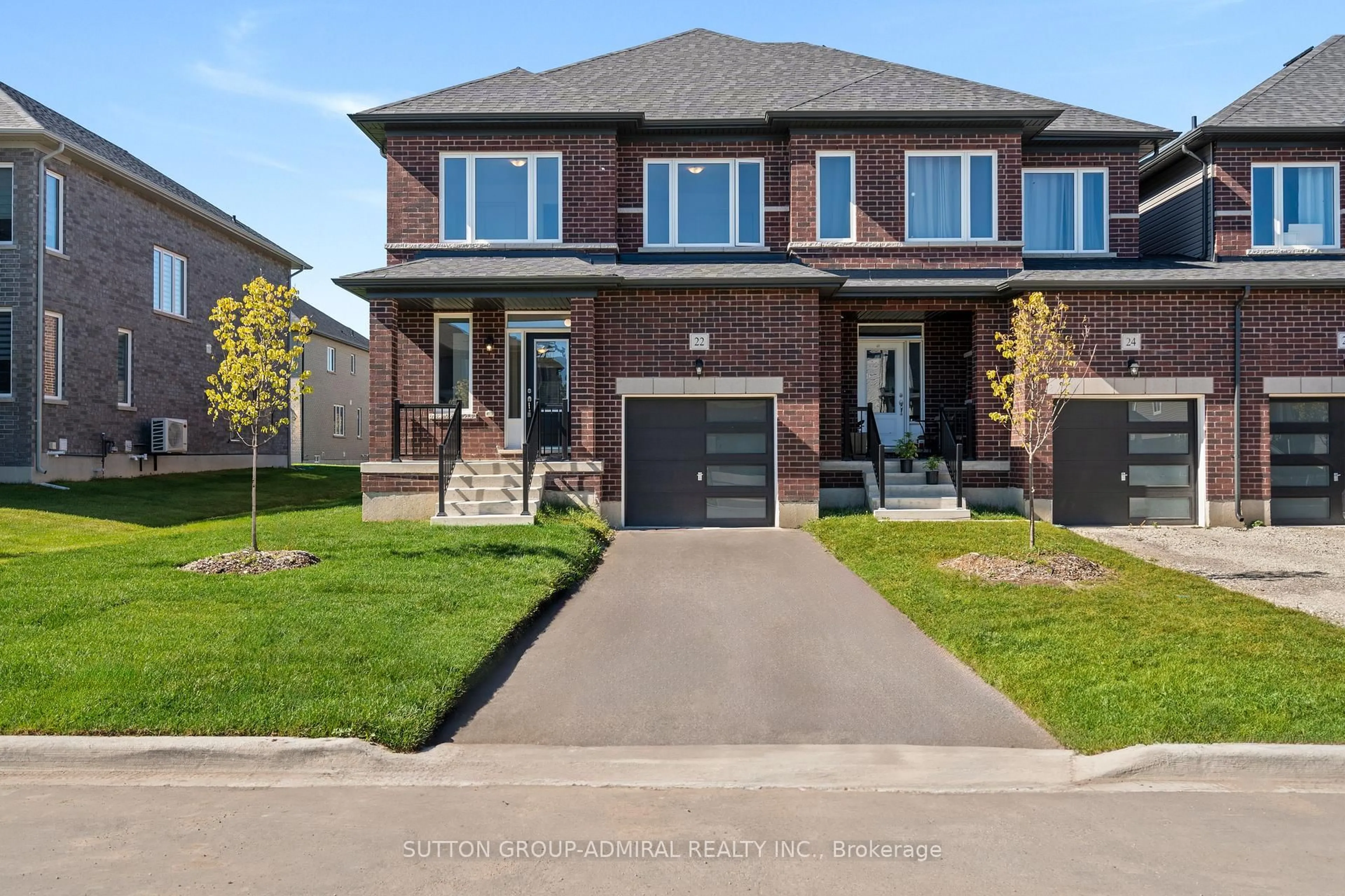 Home with brick exterior material, street for 22 Autumn Dr, Wasaga Beach Ontario L9Z 1J9