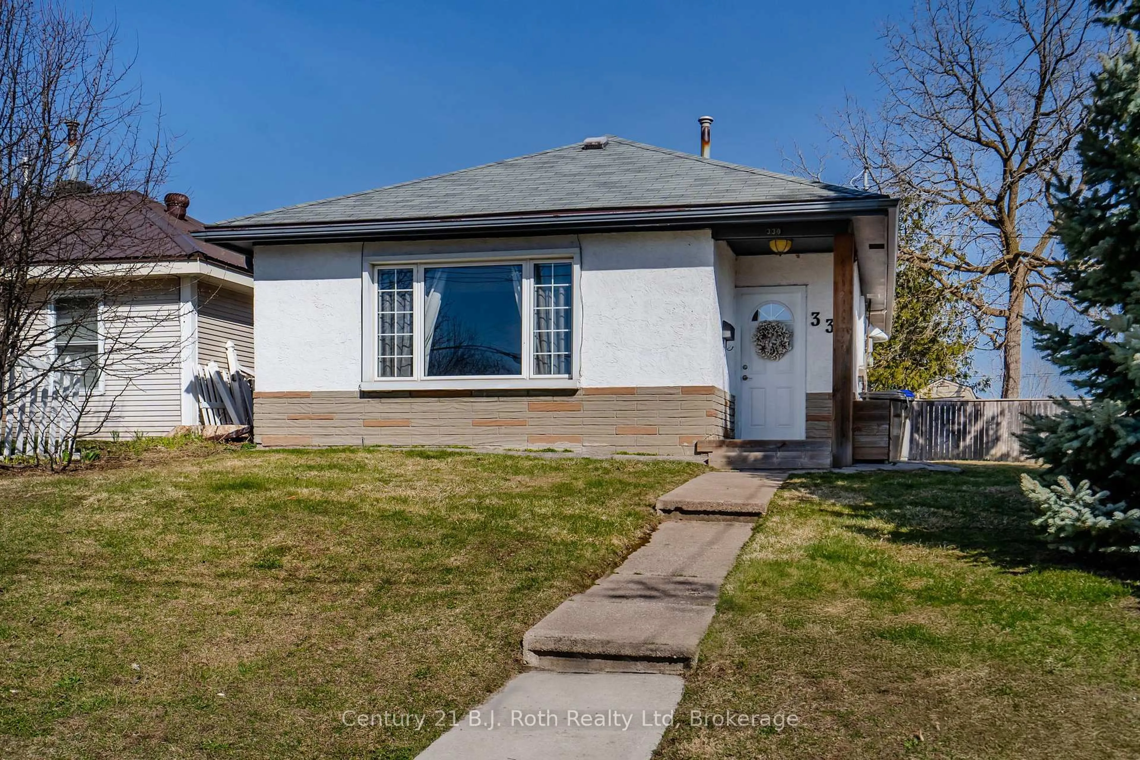 Home with vinyl exterior material, street for 330 Hugel Ave, Midland Ontario L4R 1T7