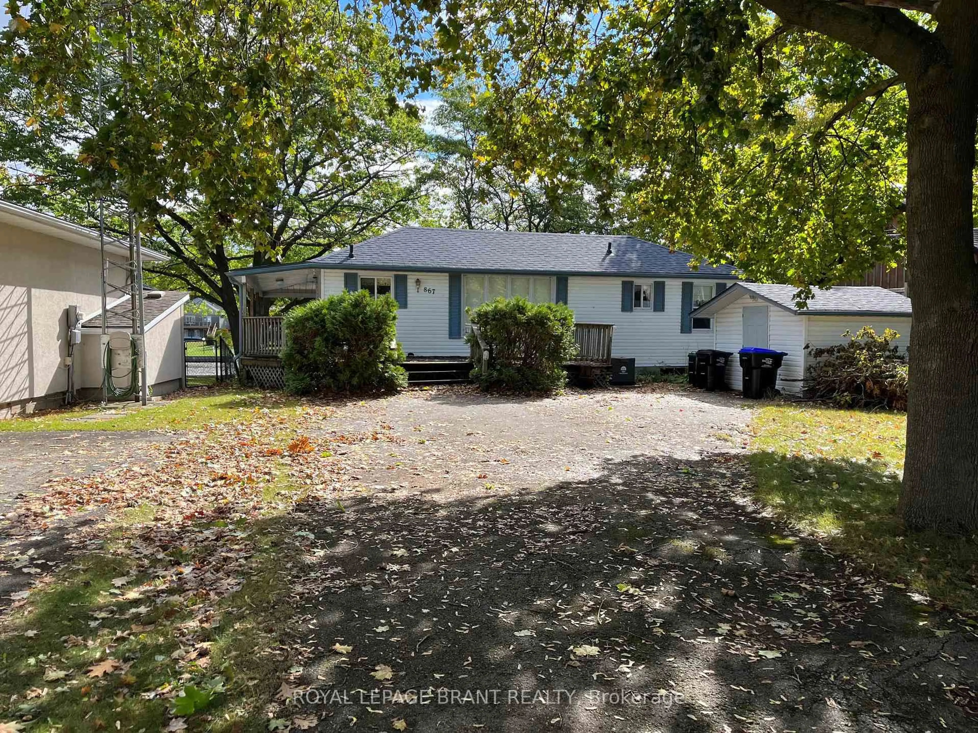 A pic from outside/outdoor area/front of a property/back of a property/a pic from drone, street for 867 Mosley St, Wasaga Beach Ontario L9Z 2H5