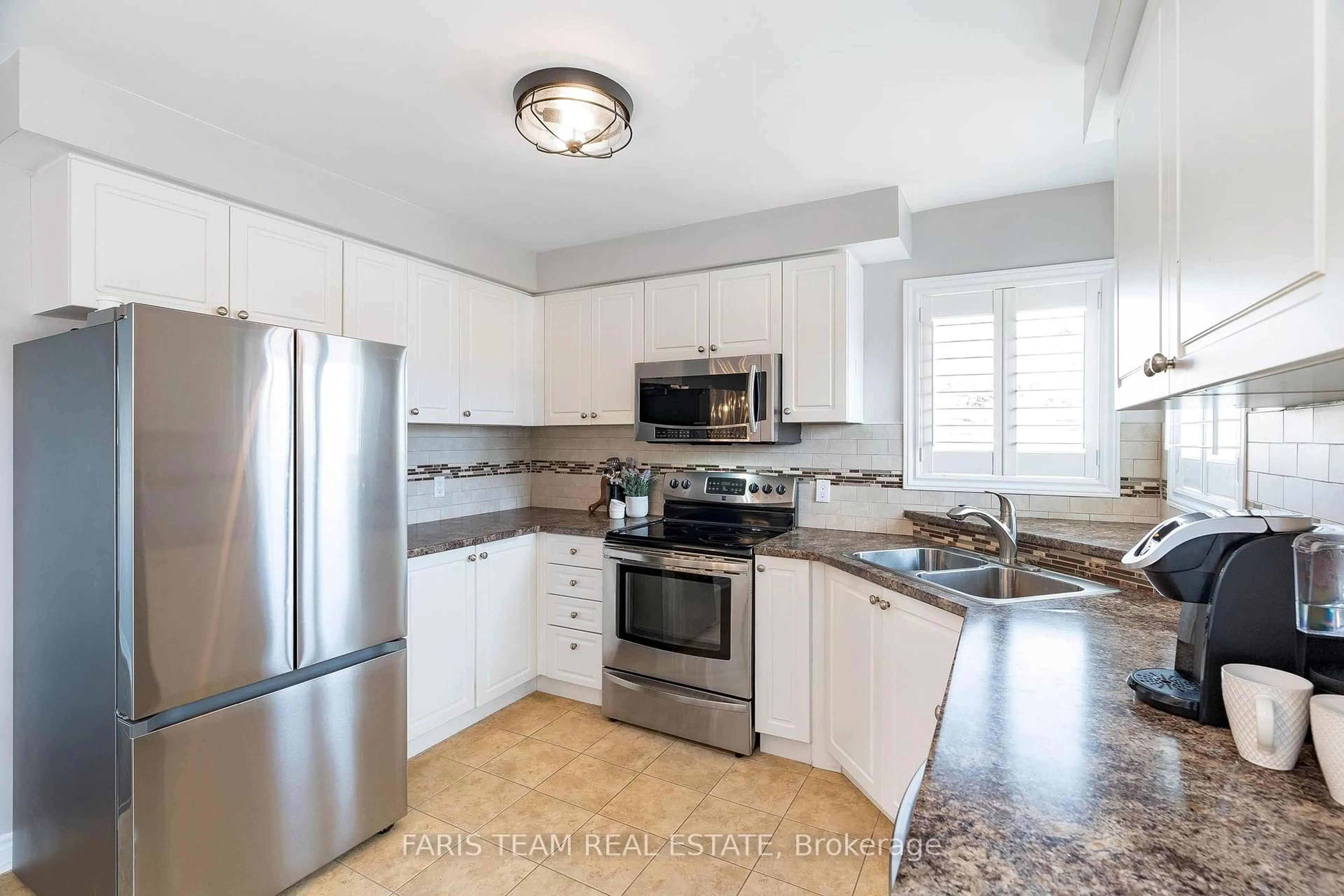 Open concept kitchen, ceramic/tile floor for 206 Wessenger Dr, Barrie Ontario L4N 8N9