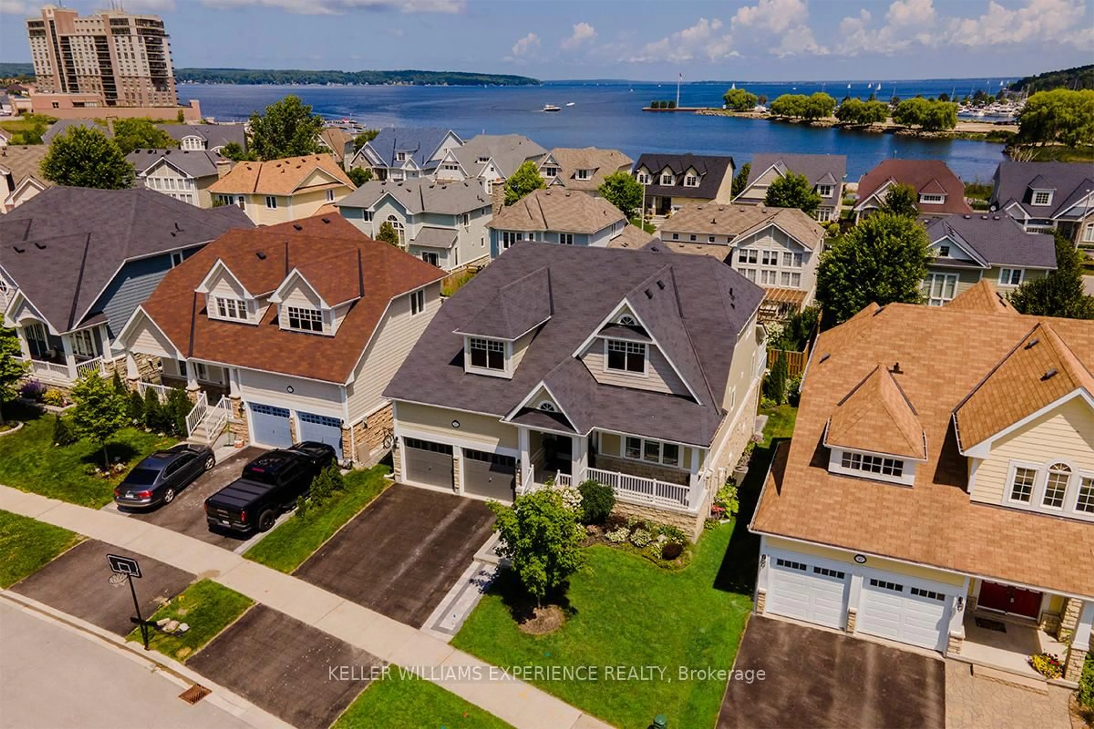 A pic from outside/outdoor area/front of a property/back of a property/a pic from drone, water/lake/river/ocean view for 101 Riverwalk Pl, Midland Ontario L4R 0B4