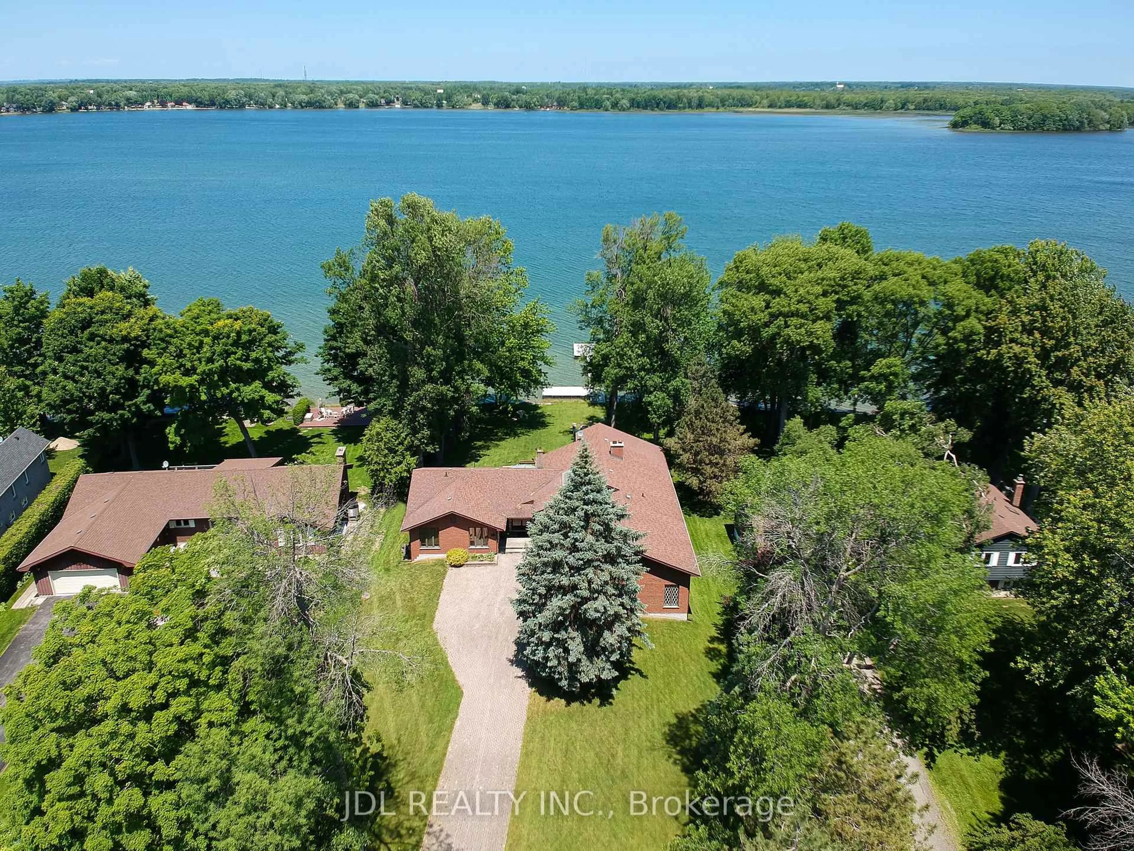 A pic from outside/outdoor area/front of a property/back of a property/a pic from drone, water/lake/river/ocean view for 16 Thicketwood Pl, Ramara Ontario L0K 1B0