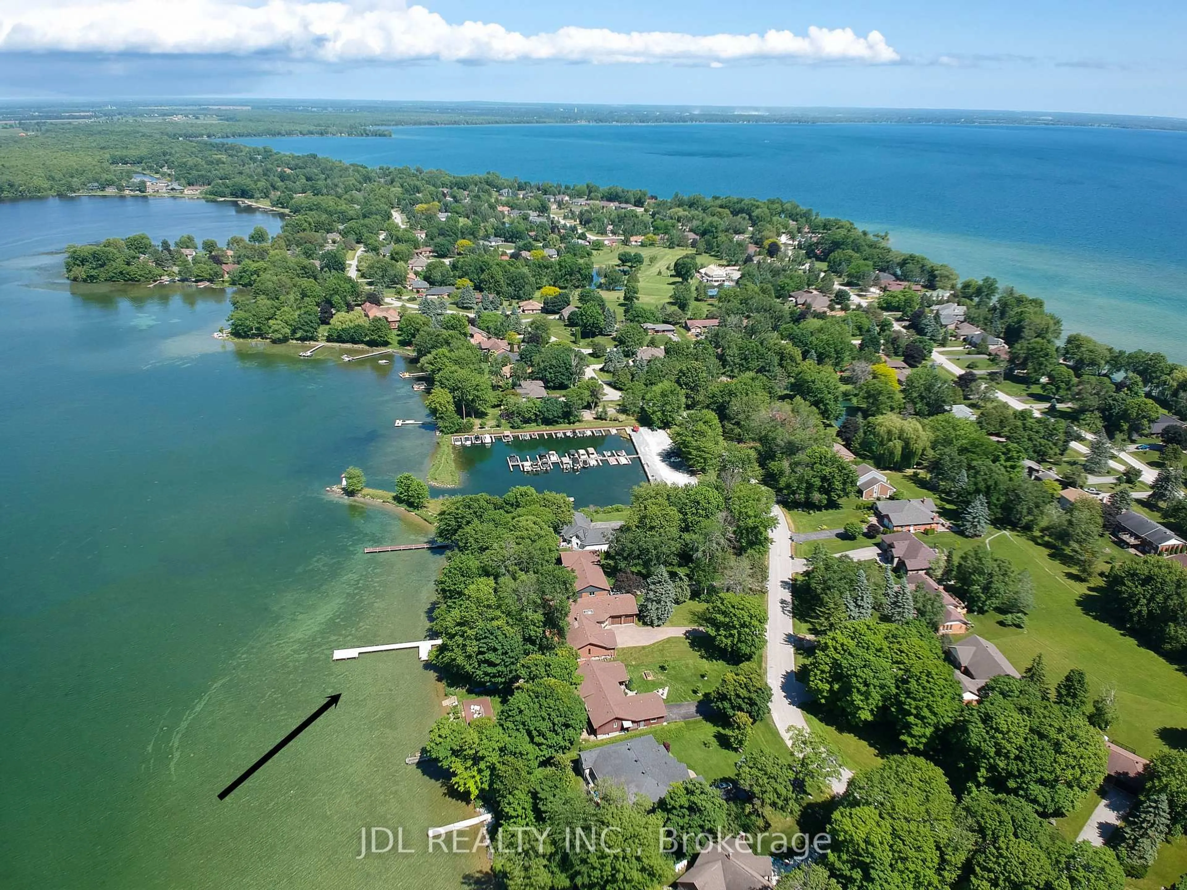 A pic from outside/outdoor area/front of a property/back of a property/a pic from drone, water/lake/river/ocean view for 16 Thicketwood Pl, Ramara Ontario L0K 1B0