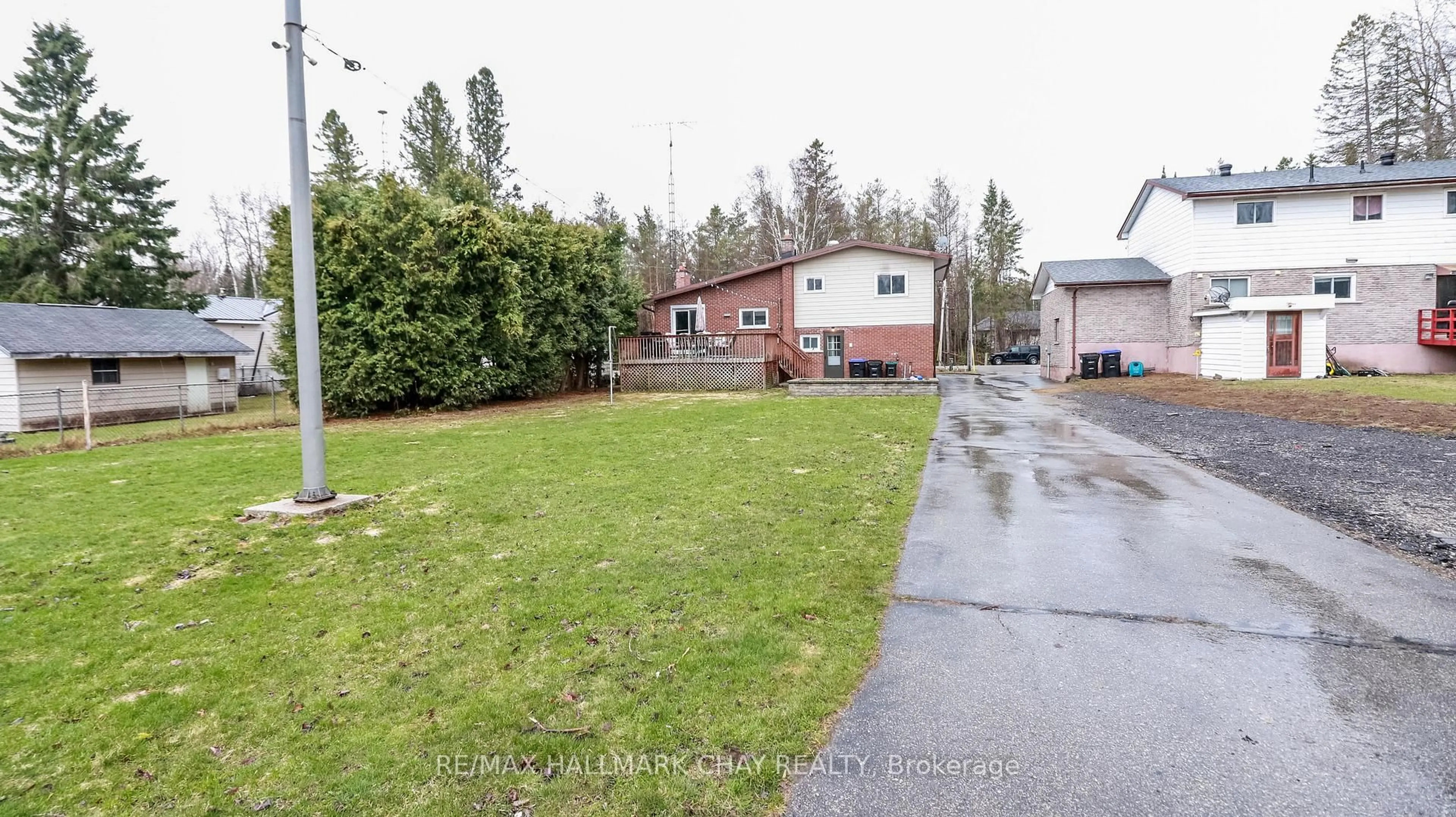 A pic from outside/outdoor area/front of a property/back of a property/a pic from drone, street for 1587 Gill Rd, Springwater Ontario L9X 1M5