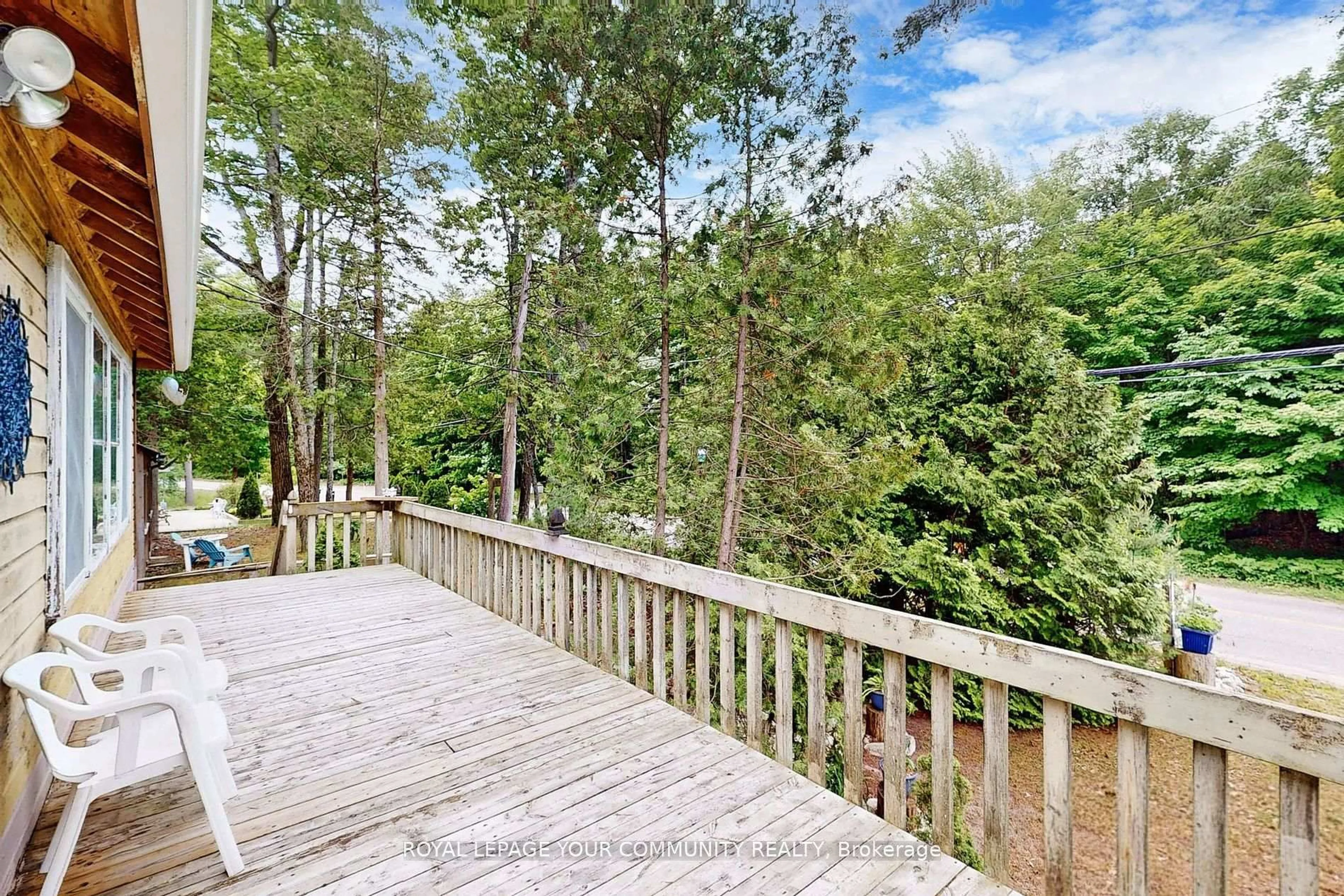 A pic from outside/outdoor area/front of a property/back of a property/a pic from drone, forest/trees view for 1207 Tiny Beaches Rd, Tiny Ontario L0L 2T0