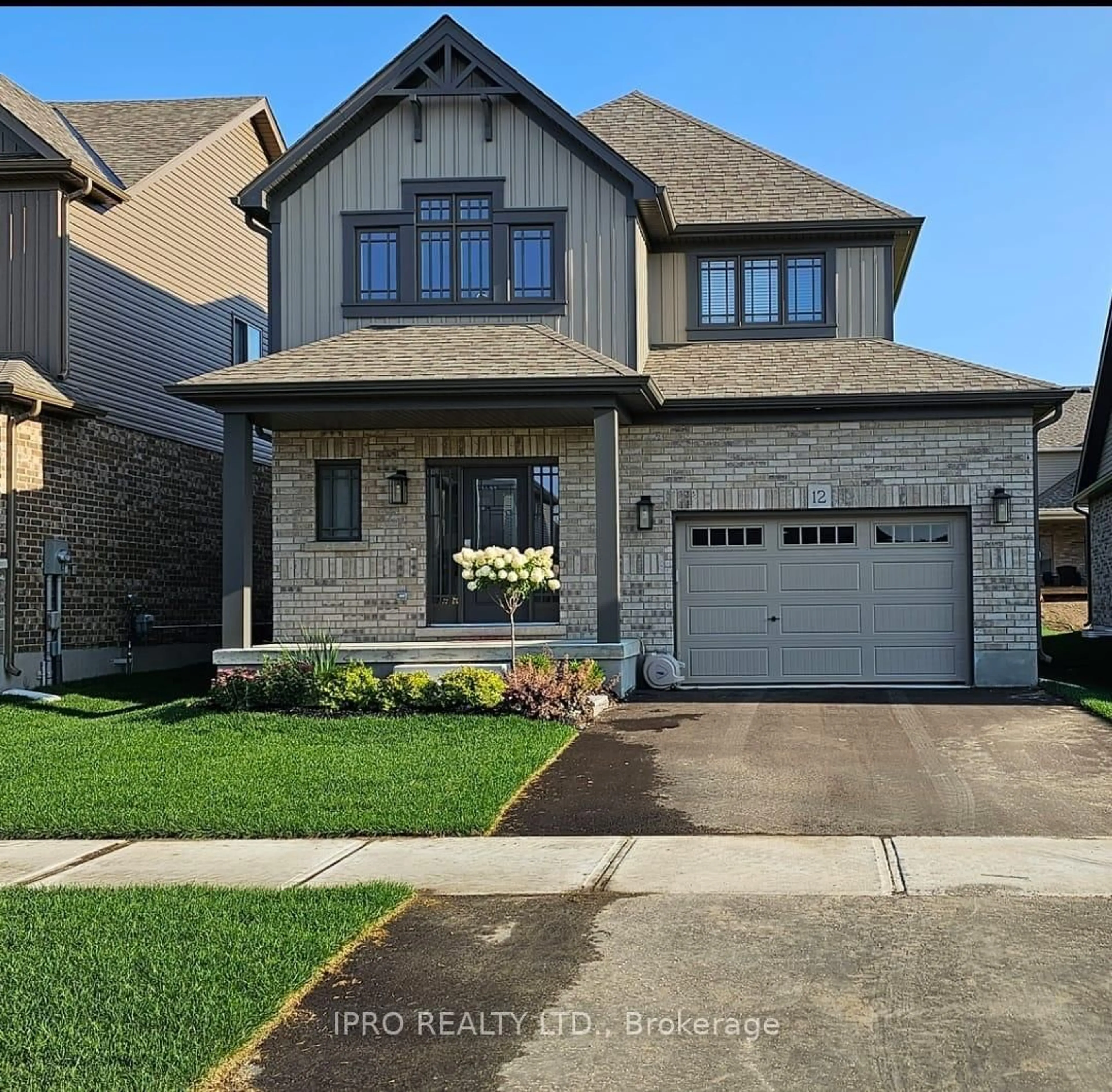 Home with brick exterior material, street for 12 Mitchell Ave, Collingwood Ontario L9Y 5M3