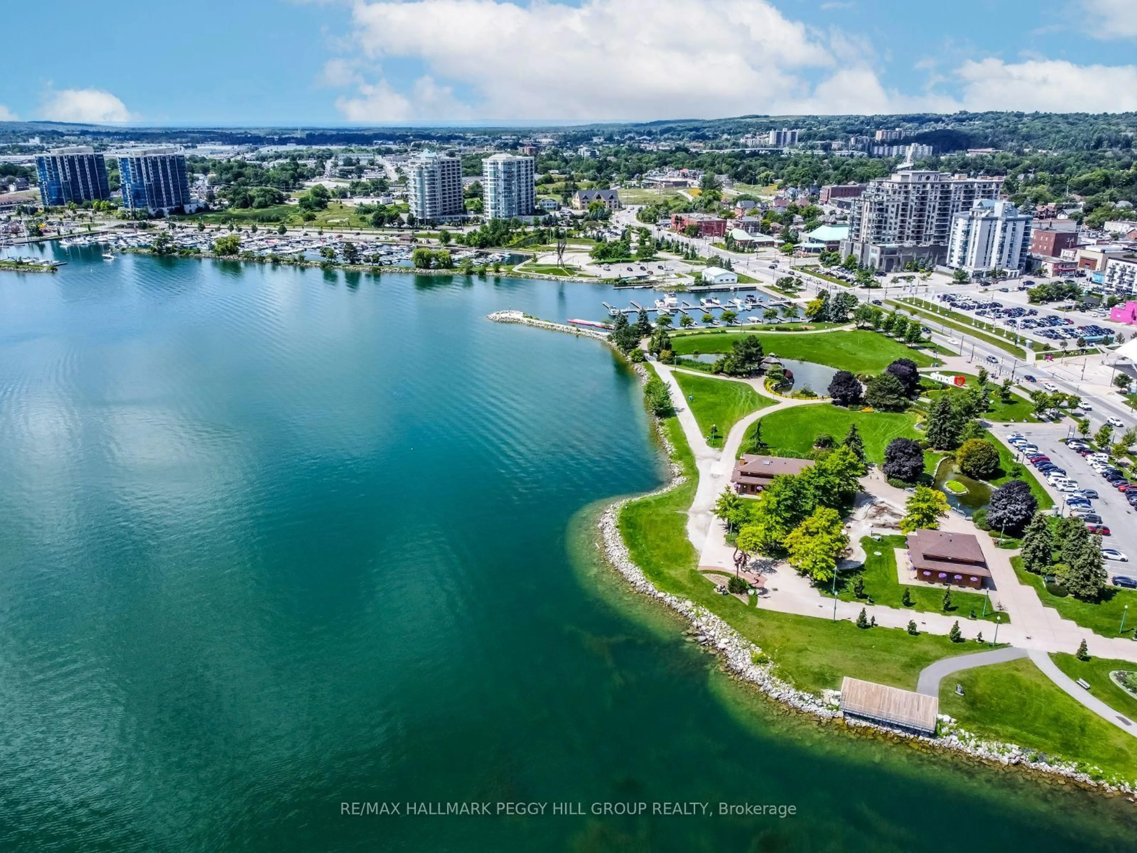 A pic from outside/outdoor area/front of a property/back of a property/a pic from drone, water/lake/river/ocean view for 140 Dunlop St #605, Barrie Ontario L4M 6H9