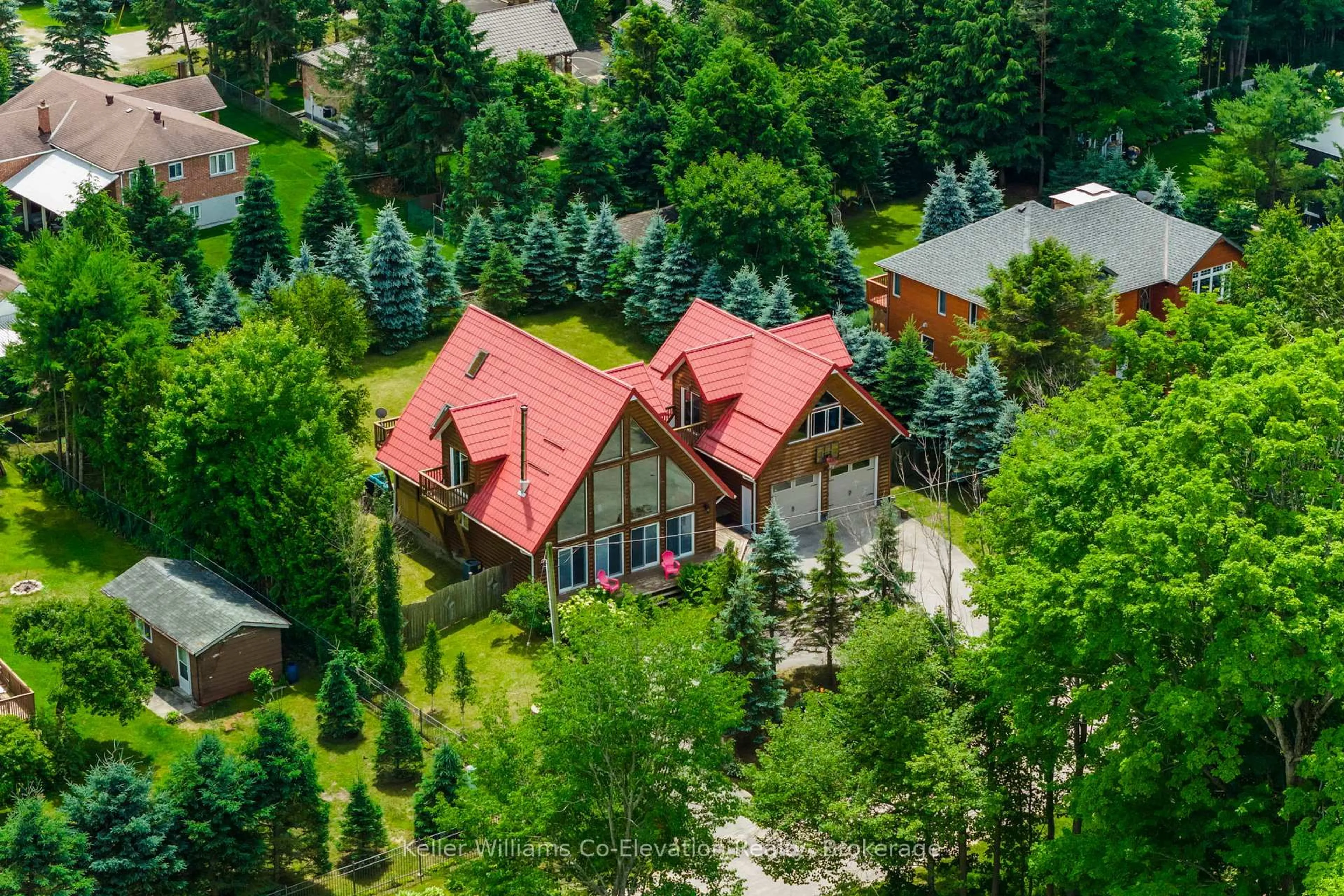 A pic from outside/outdoor area/front of a property/back of a property/a pic from drone, forest/trees view for 9 Philpark Rd, Tiny Ontario L9M 0M7