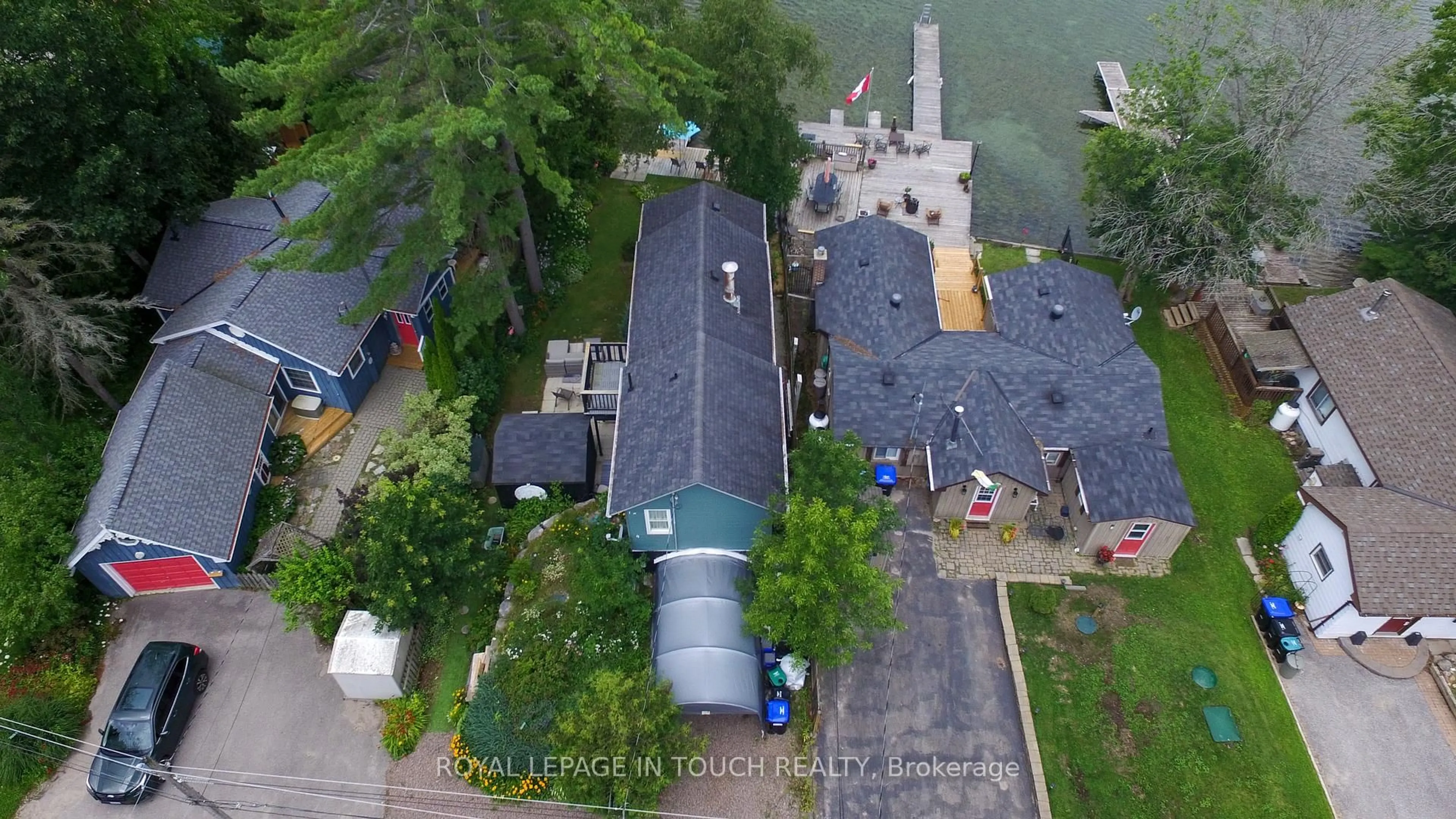 A pic from outside/outdoor area/front of a property/back of a property/a pic from drone, street for 7698 Oak Point Rd, Ramara Ontario L0K 2B0