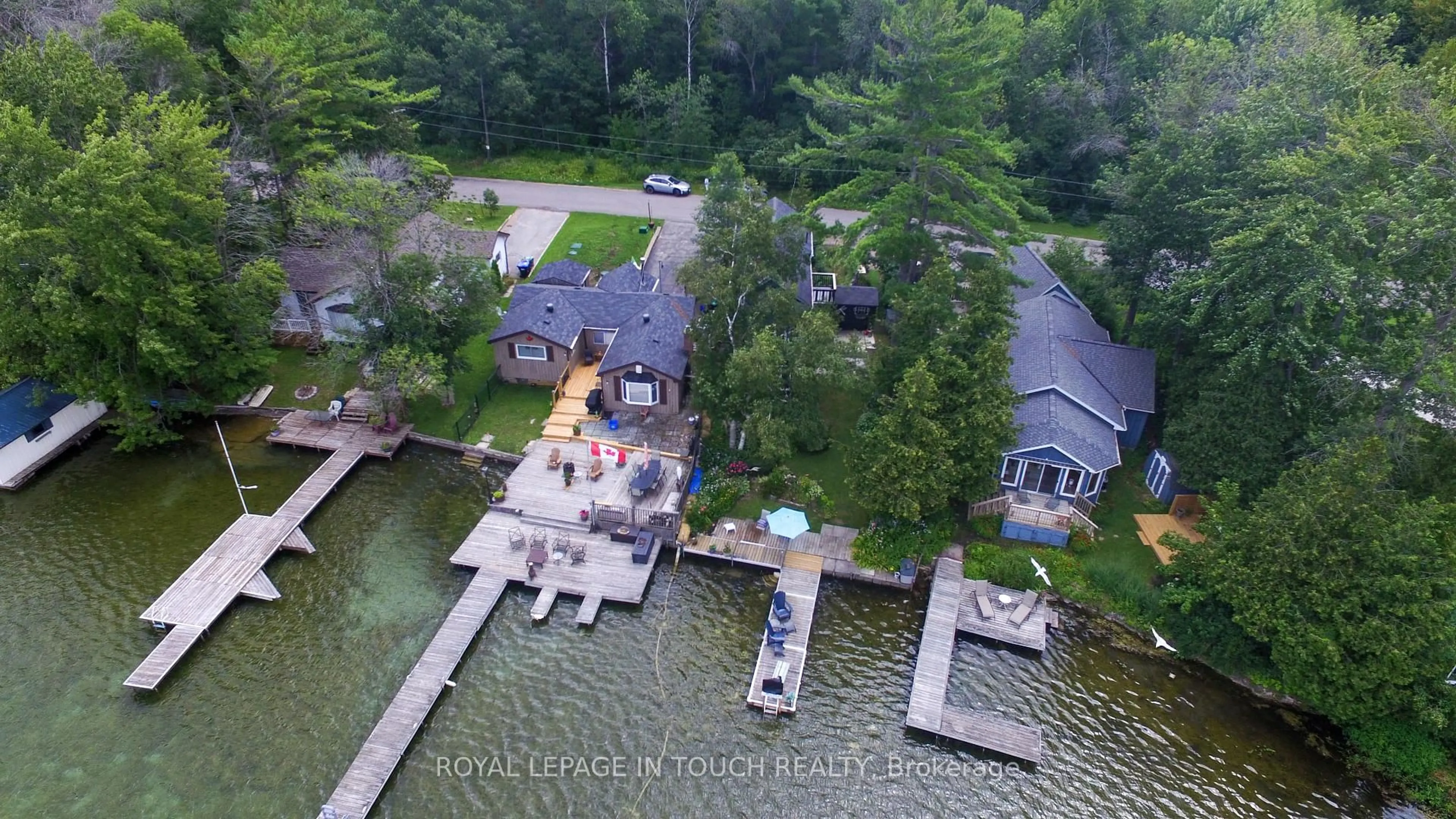 A pic from outside/outdoor area/front of a property/back of a property/a pic from drone, water/lake/river/ocean view for 7698 Oak Point Rd, Ramara Ontario L0K 2B0