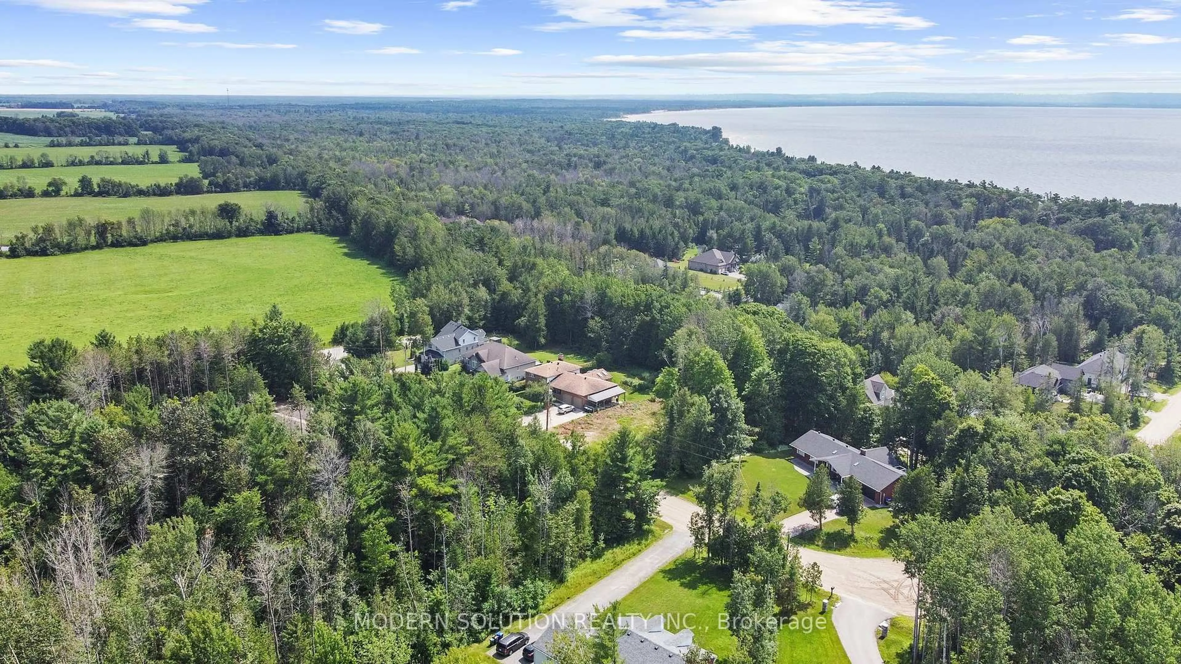 A pic from outside/outdoor area/front of a property/back of a property/a pic from drone, water/lake/river/ocean view for 23 Elizabeth Ave, Tiny Ontario L0L 1P1