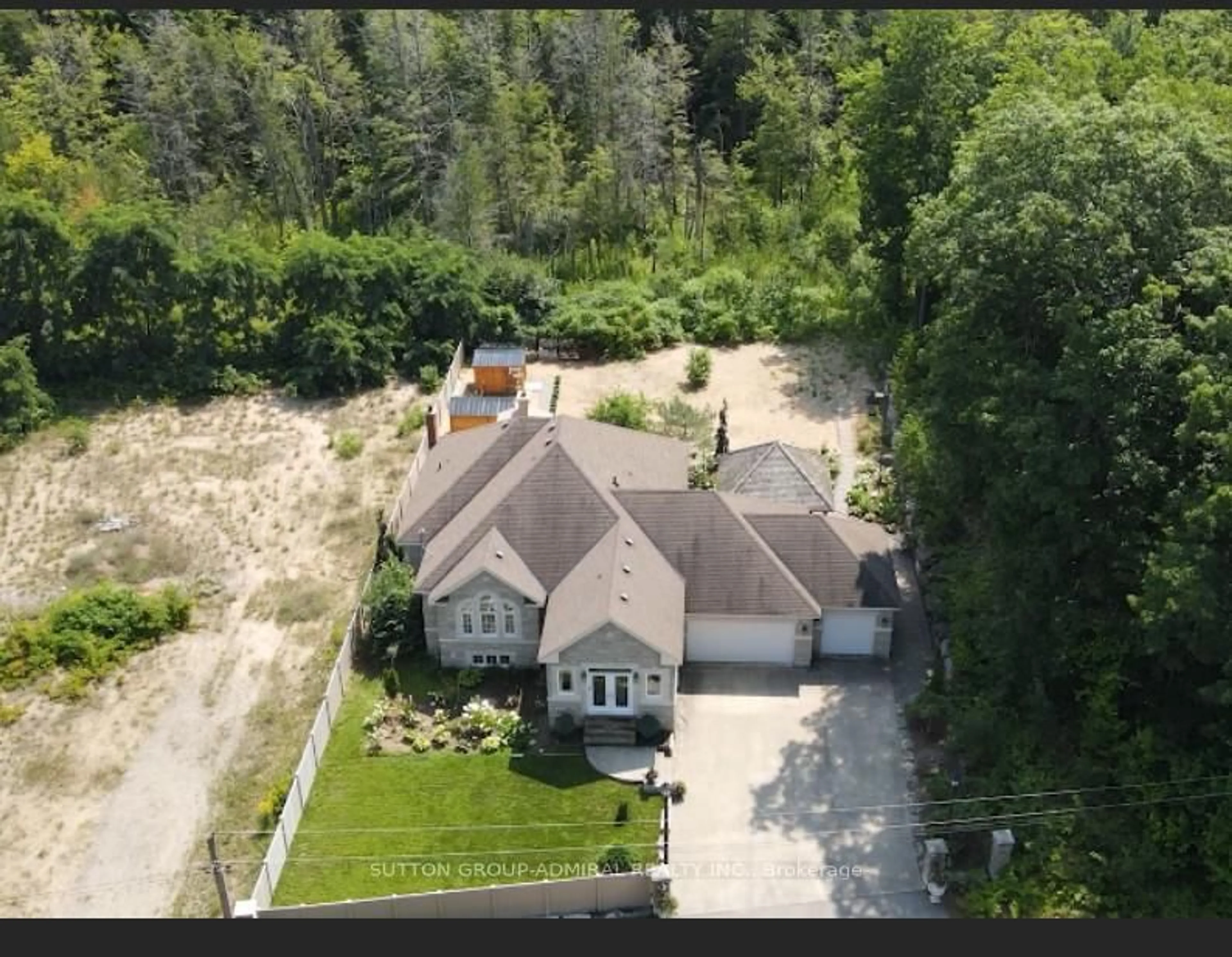 A pic from outside/outdoor area/front of a property/back of a property/a pic from drone, unknown for 9 Tucson Rd, Tiny Ontario L9M 0B6