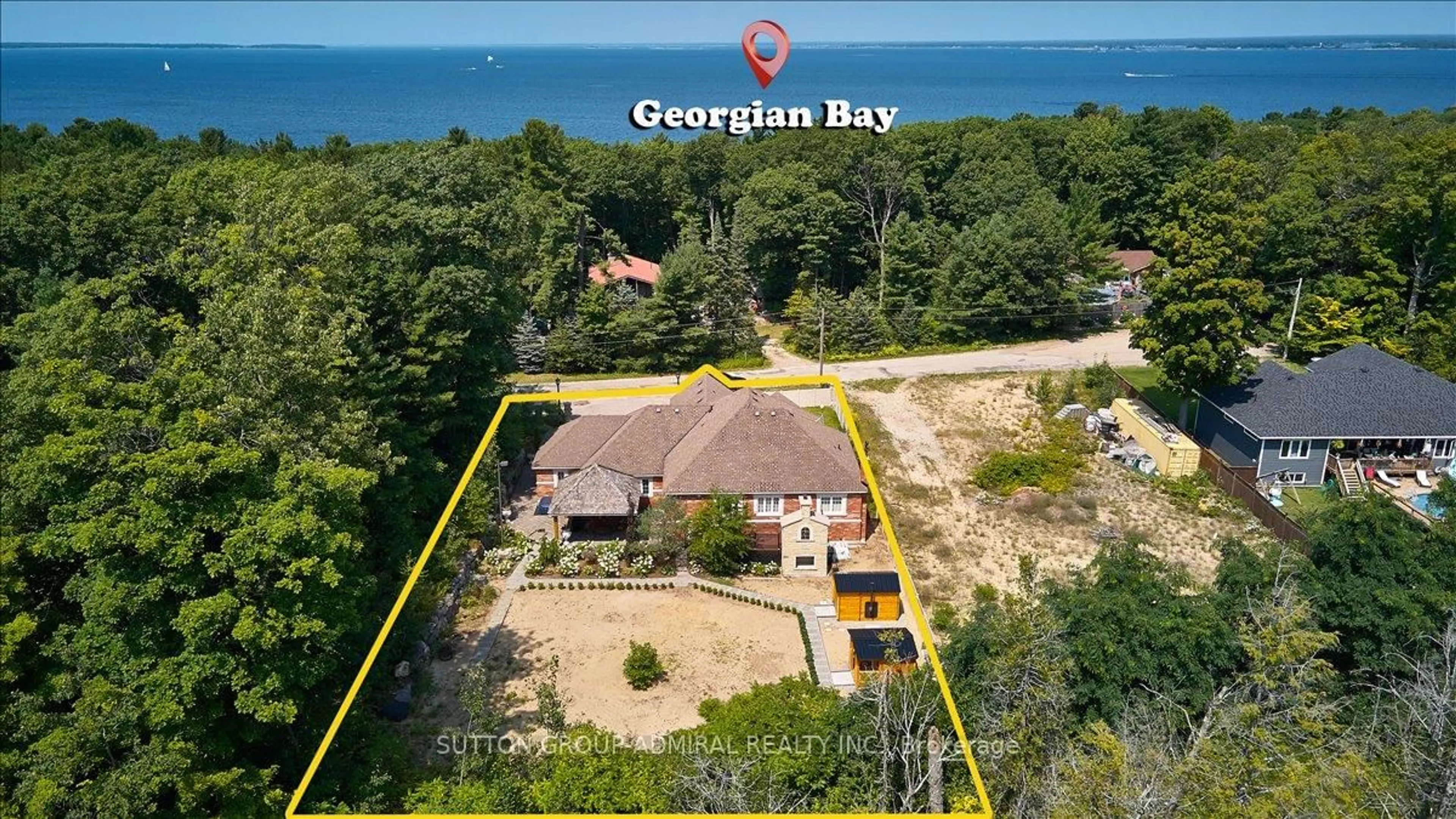 A pic from outside/outdoor area/front of a property/back of a property/a pic from drone, water/lake/river/ocean view for 9 Tucson Rd, Tiny Ontario L9M 0B6