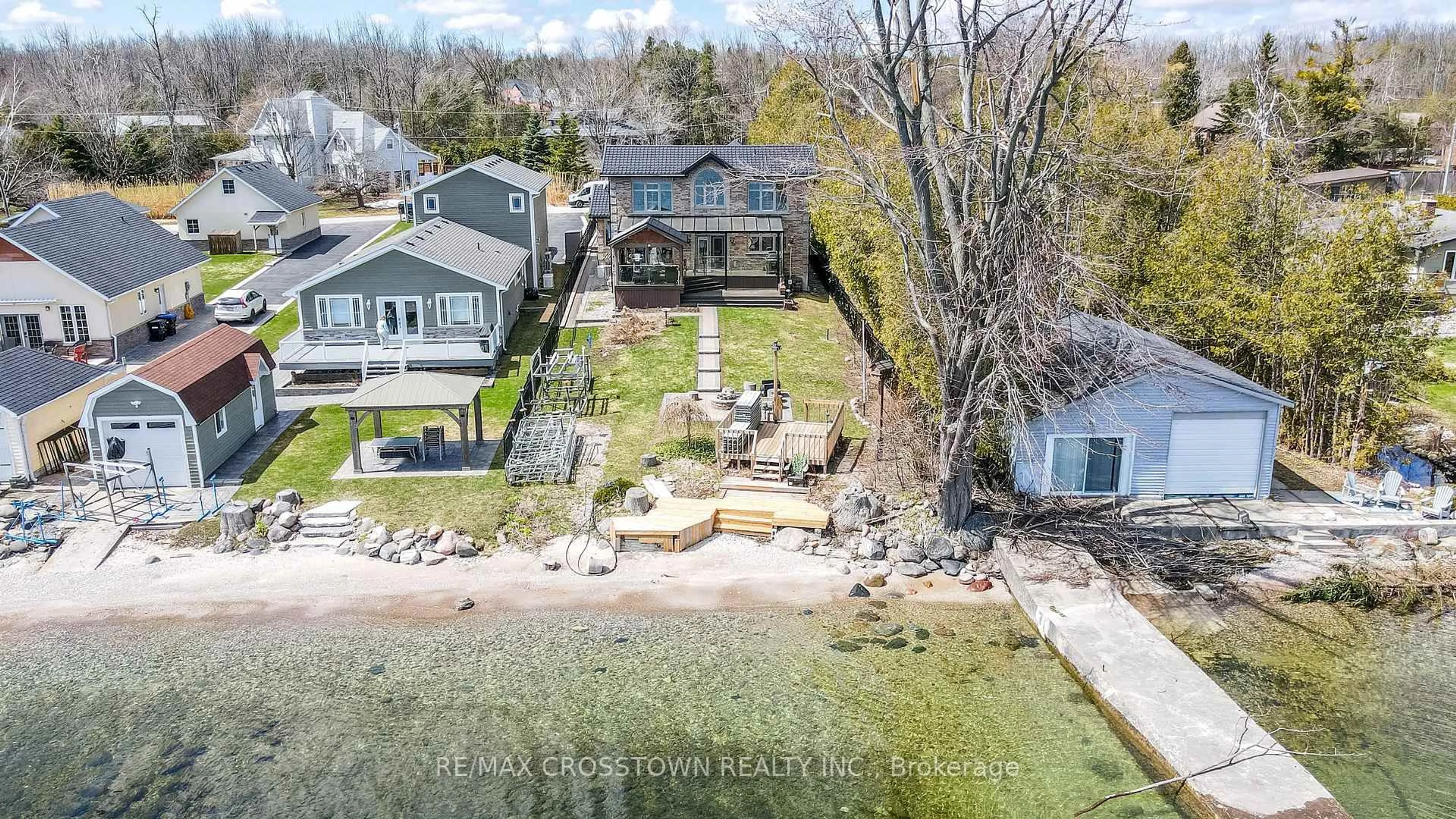 A pic from outside/outdoor area/front of a property/back of a property/a pic from drone, water/lake/river/ocean view for 15 Palm Beach Rd, Oro-Medonte Ontario L0L 1T0