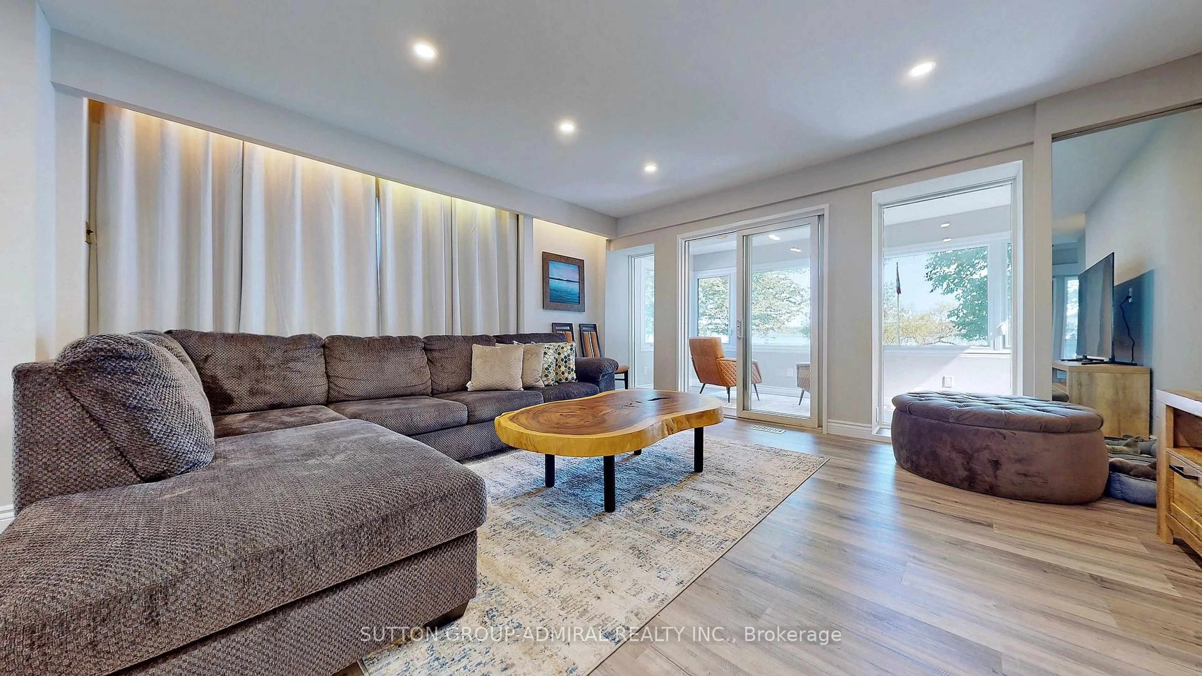 Living room with furniture, wood/laminate floor for 743 Broadview Ave, Orillia Ontario L3V 6P1
