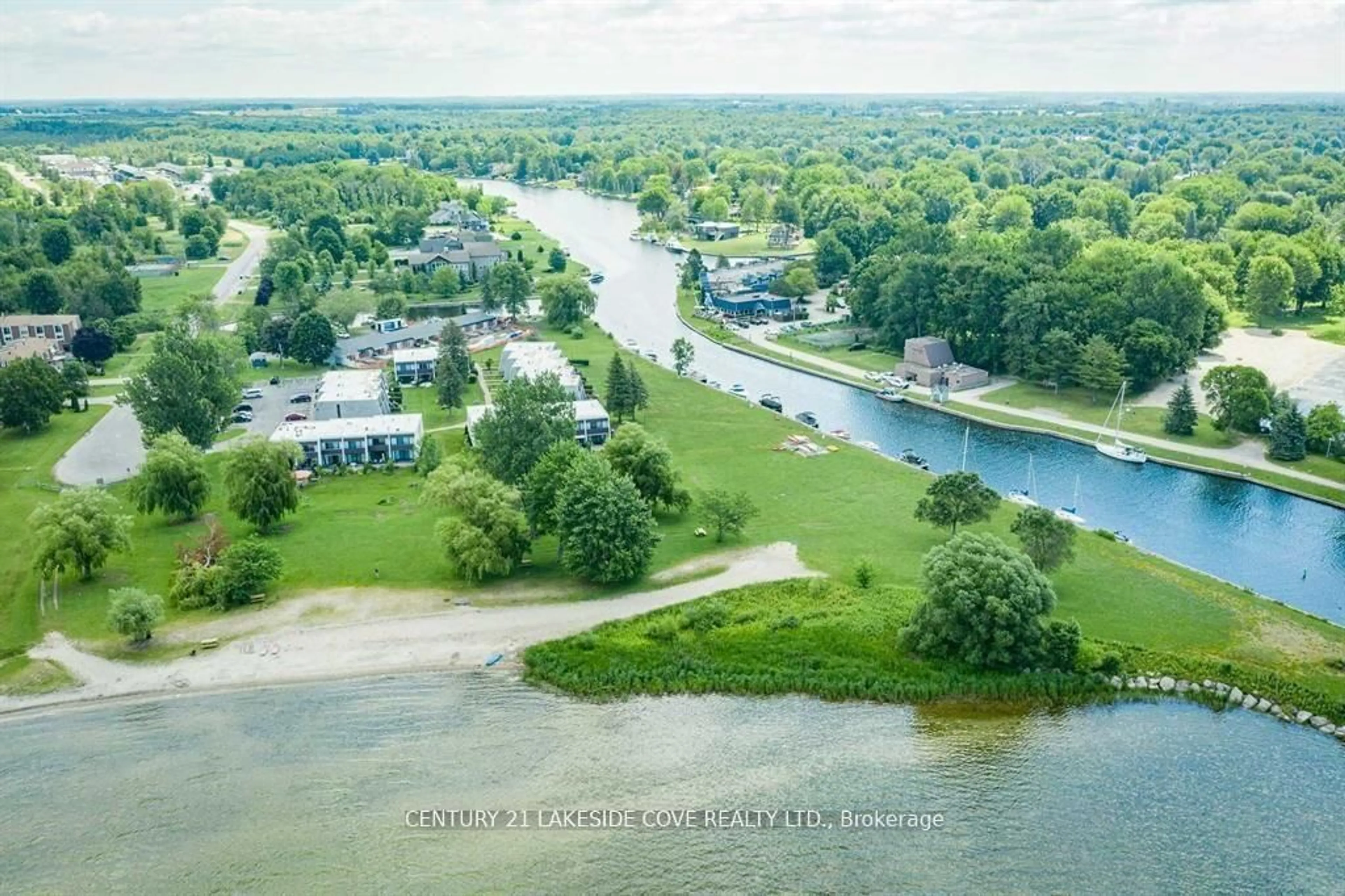 A pic from outside/outdoor area/front of a property/back of a property/a pic from drone, water/lake/river/ocean view for 1 Paradise Blvd #Unit 27, Ramara Ontario L0K 1B0