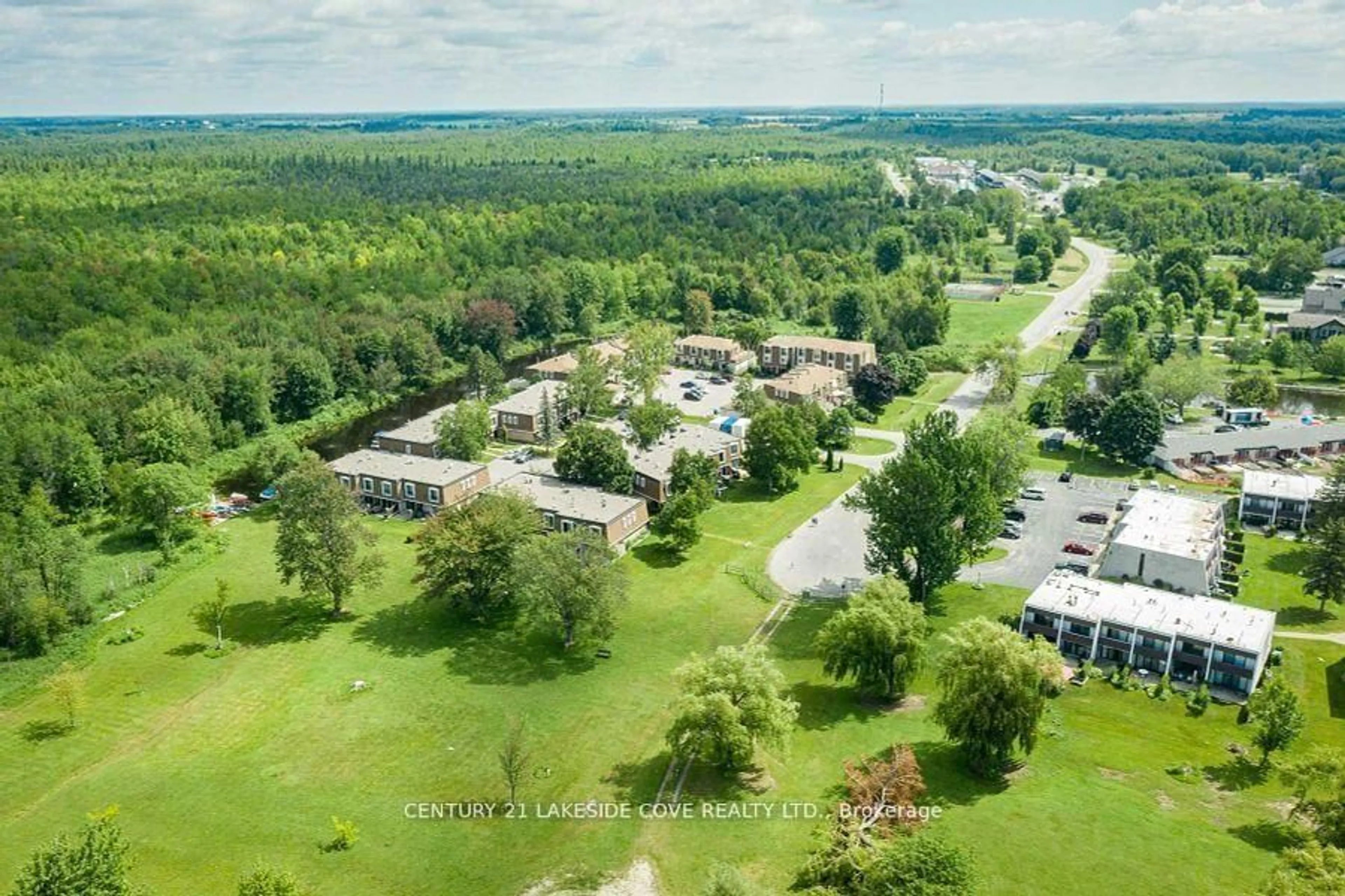 A pic from outside/outdoor area/front of a property/back of a property/a pic from drone, unknown for 1 Paradise Blvd #Unit 27, Ramara Ontario L0K 1B0