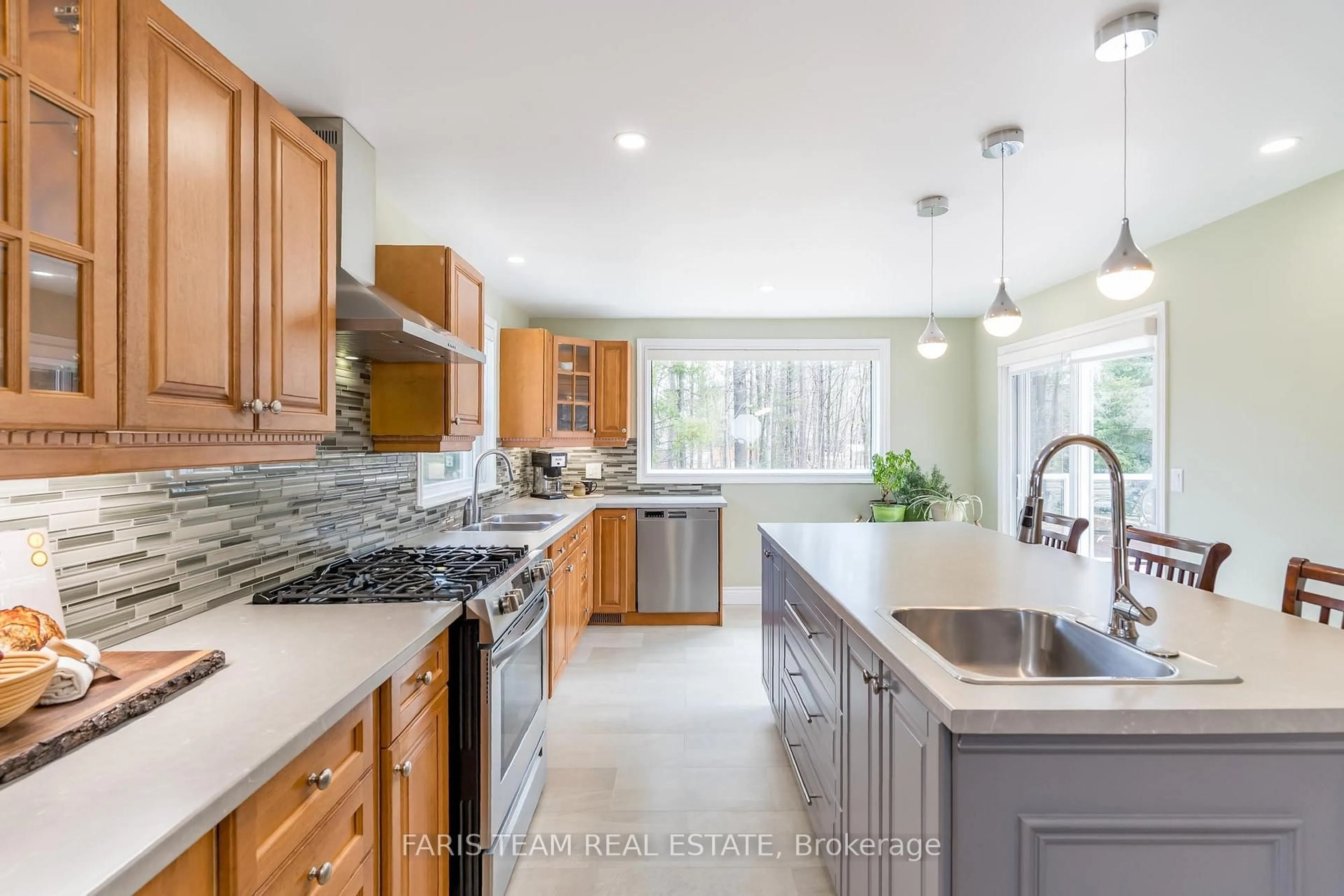 Open concept kitchen, ceramic/tile floor for 63 Bailey Cres, Tiny Ontario L0L 2T0