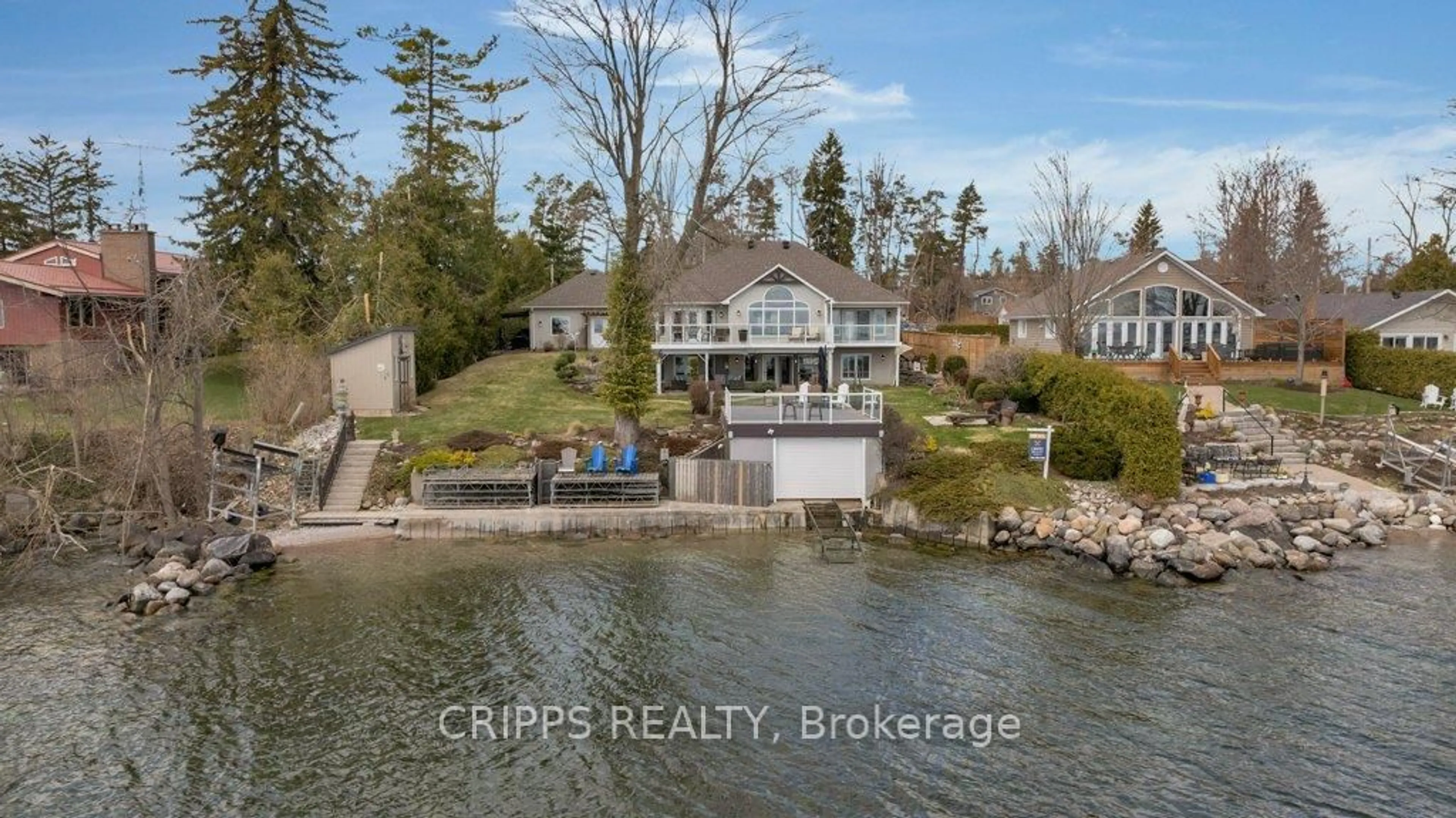 A pic from outside/outdoor area/front of a property/back of a property/a pic from drone, water/lake/river/ocean view for 91 Lakeshore Rd, Oro-Medonte Ontario L0L 2E0
