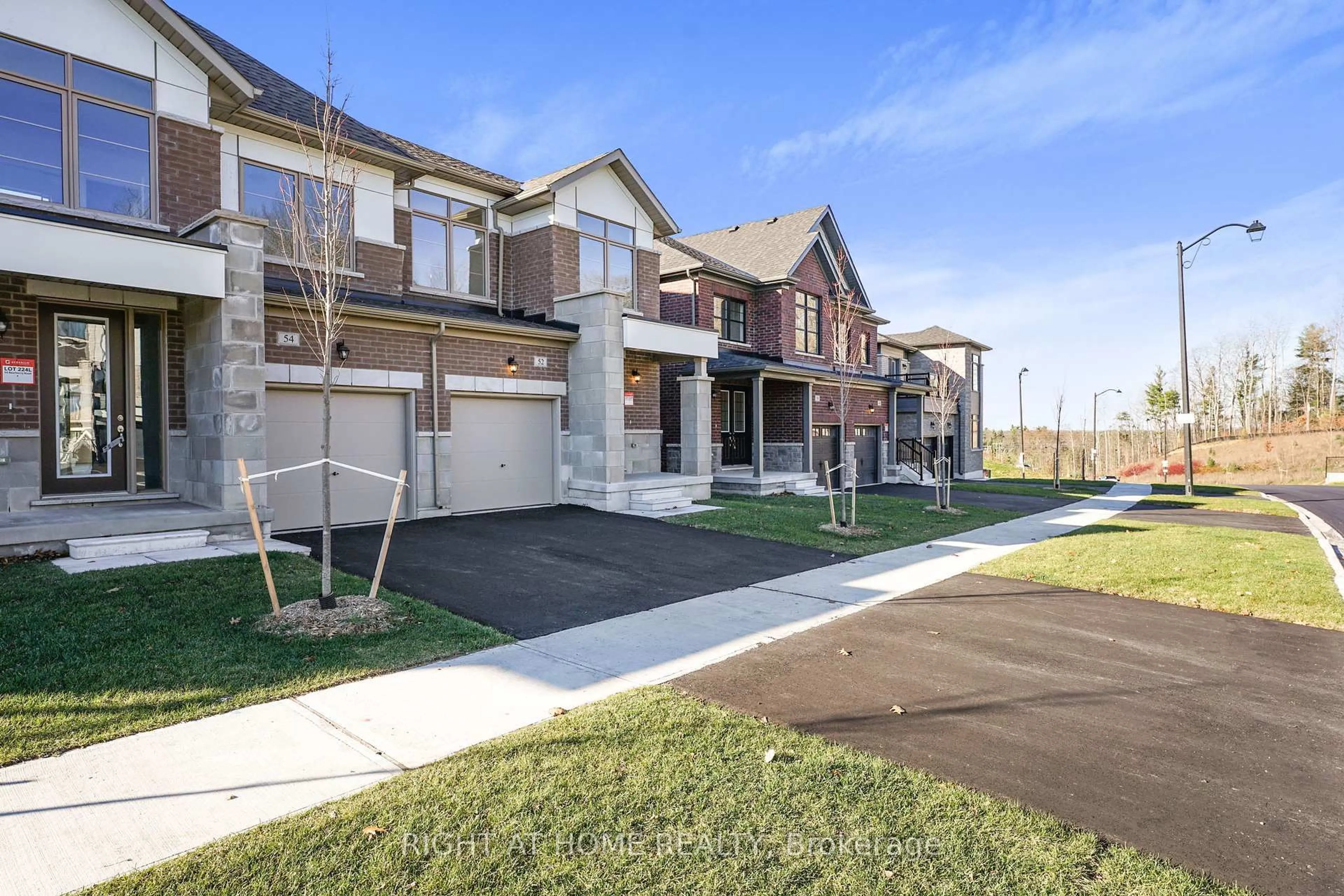 Home with brick exterior material, street for 52 Bearberry Rd, Springwater Ontario L9X 2E2