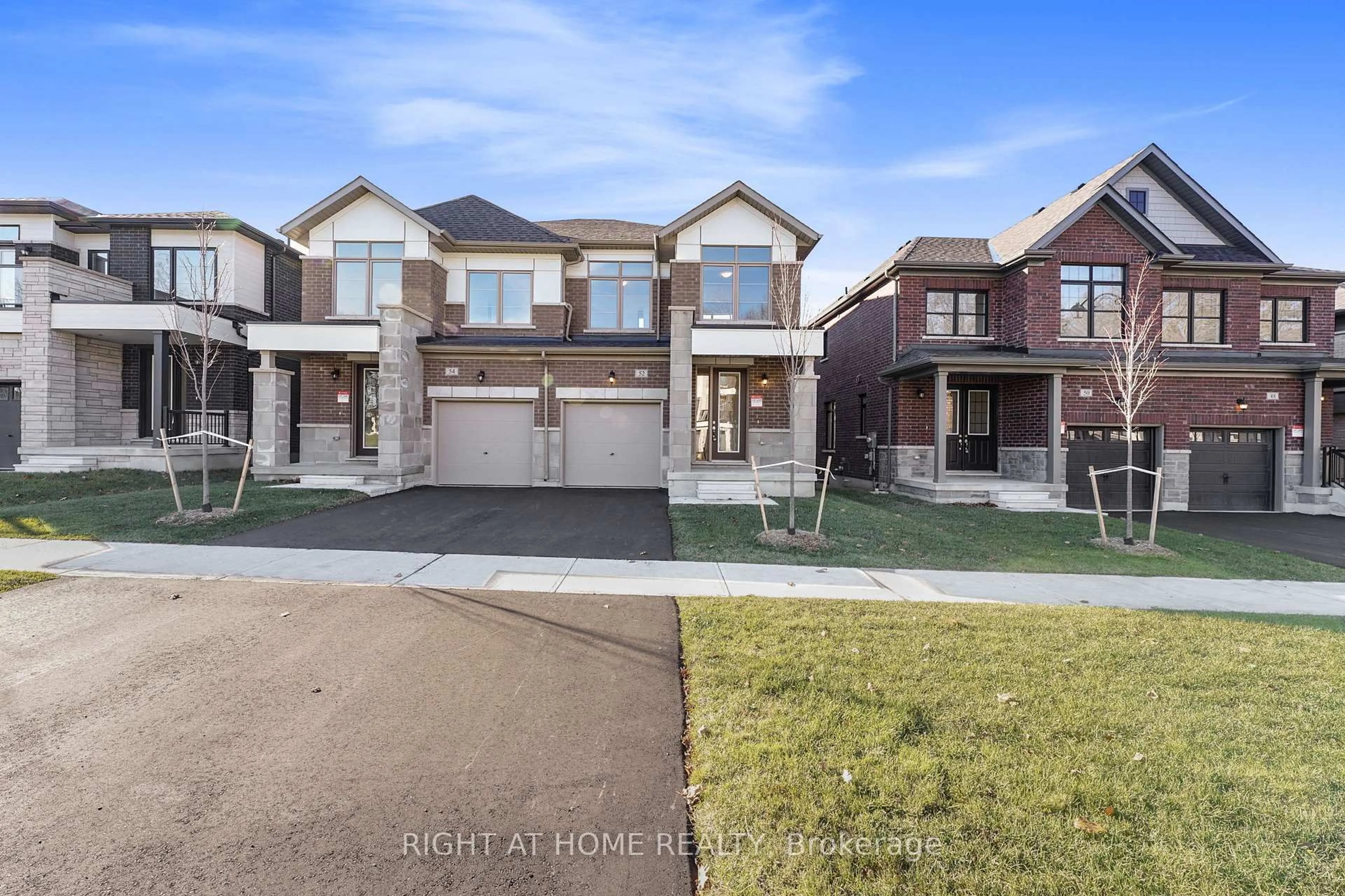 Home with brick exterior material, street for 52 Bearberry Rd, Springwater Ontario L9X 2E2