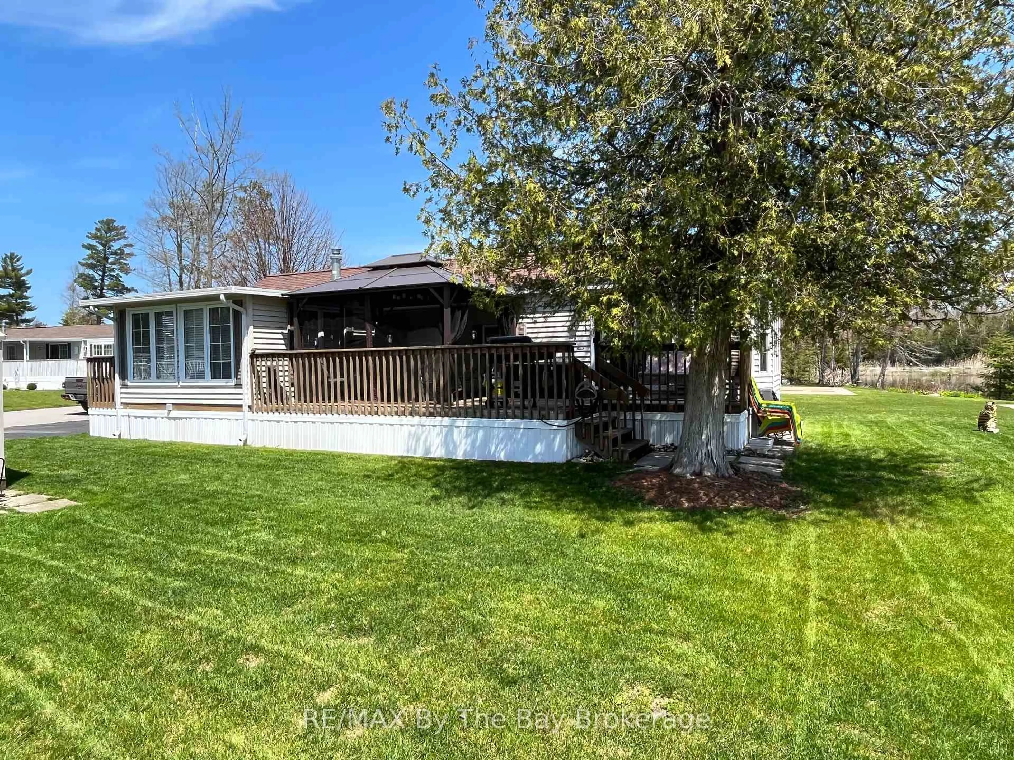 A pic from outside/outdoor area/front of a property/back of a property/a pic from drone, water/lake/river/ocean view for 3 WHITE PINES Tr, Wasaga Beach Ontario L9Z 1X7