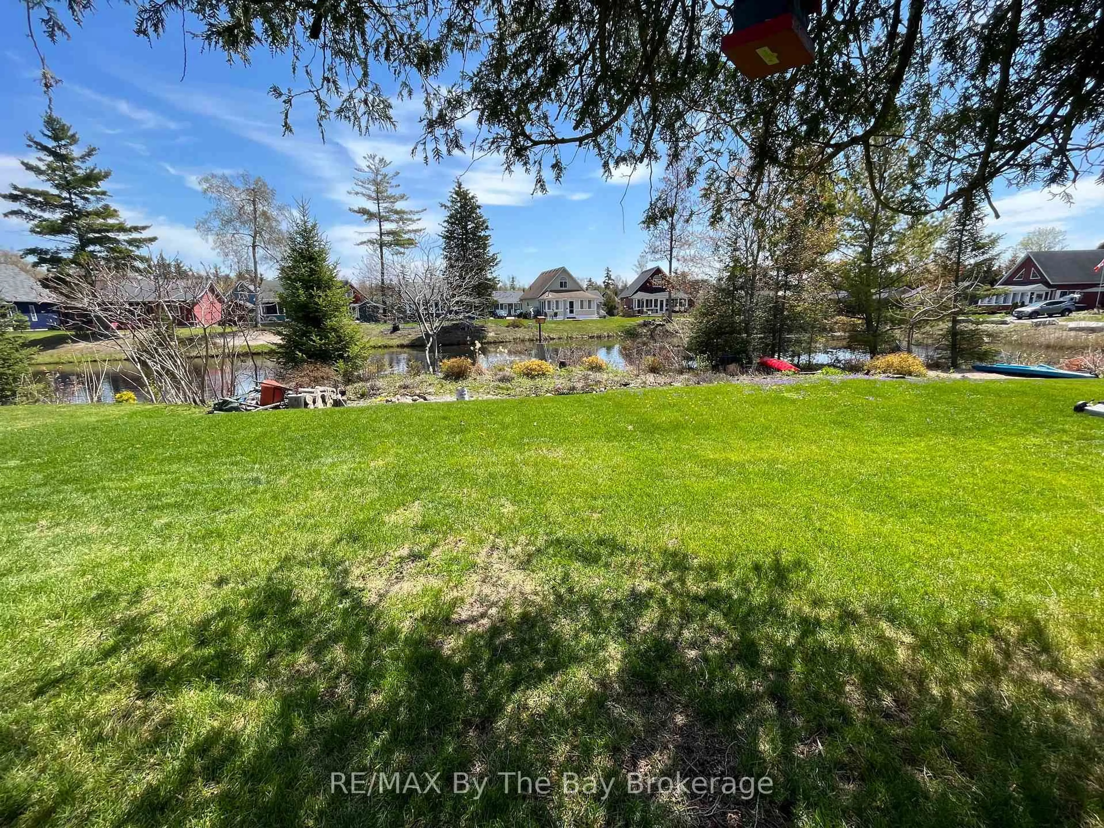 A pic from outside/outdoor area/front of a property/back of a property/a pic from drone, water/lake/river/ocean view for 3 WHITE PINES Tr, Wasaga Beach Ontario L9Z 1X7