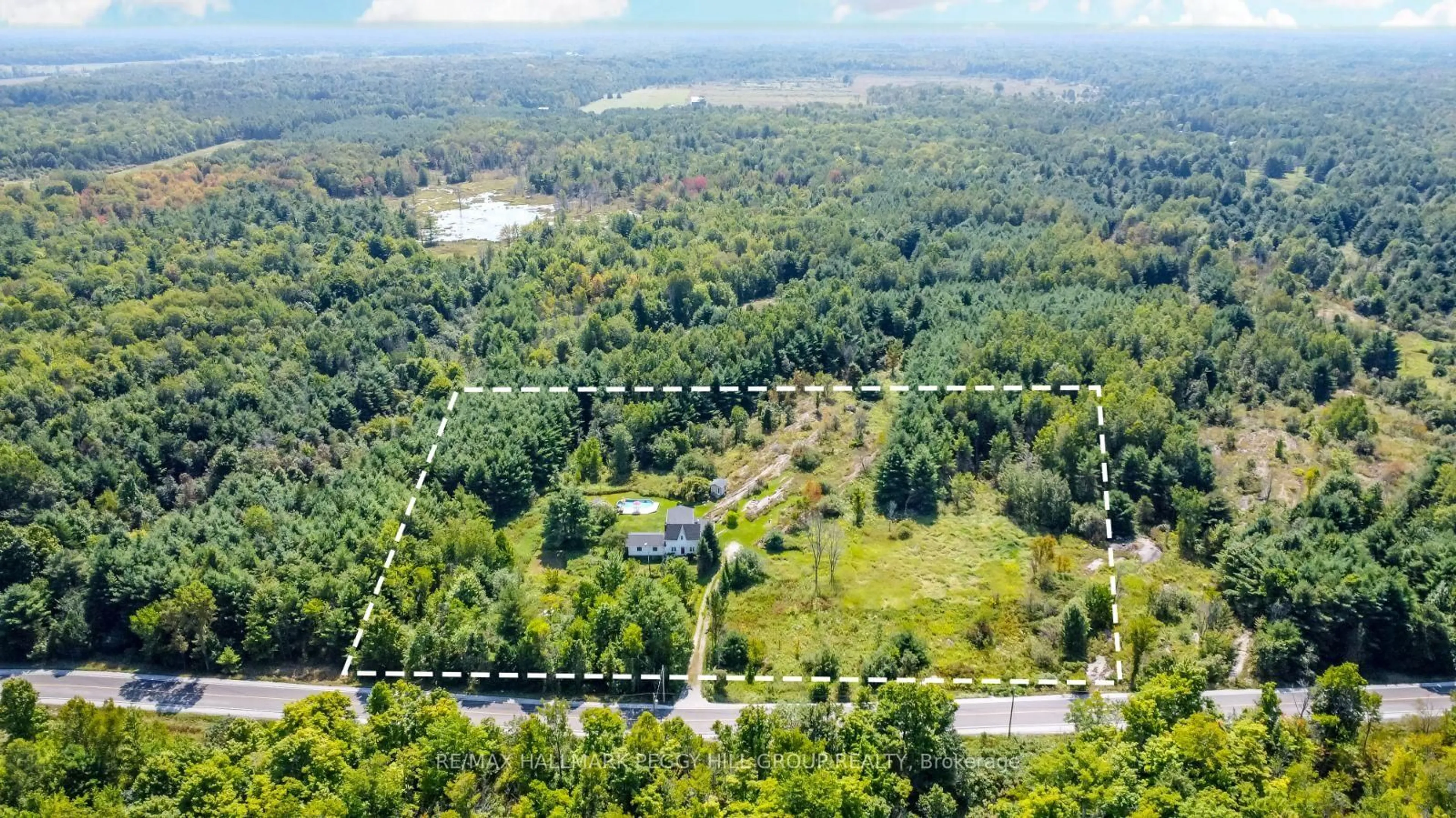A pic from outside/outdoor area/front of a property/back of a property/a pic from drone, forest/trees view for 2161 Coopers Falls Rd, Severn Ontario L0K 2B0
