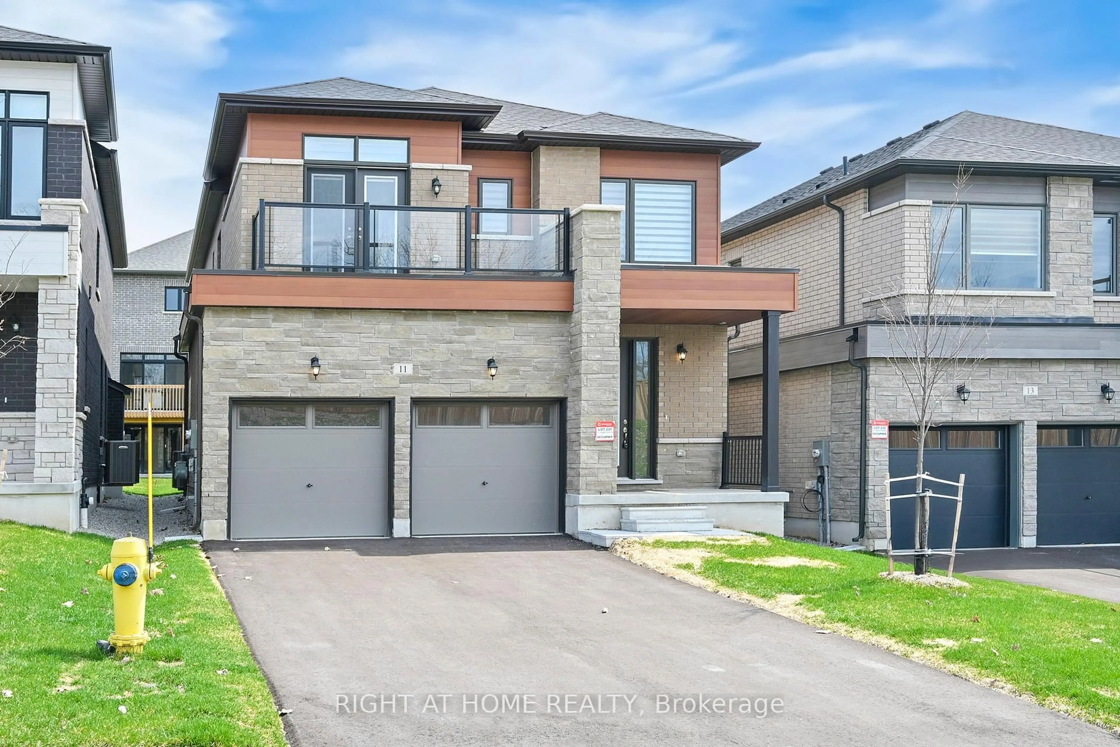 Home with brick exterior material, street for 11 Calypso Ave, Springwater Ontario L9X 2E1