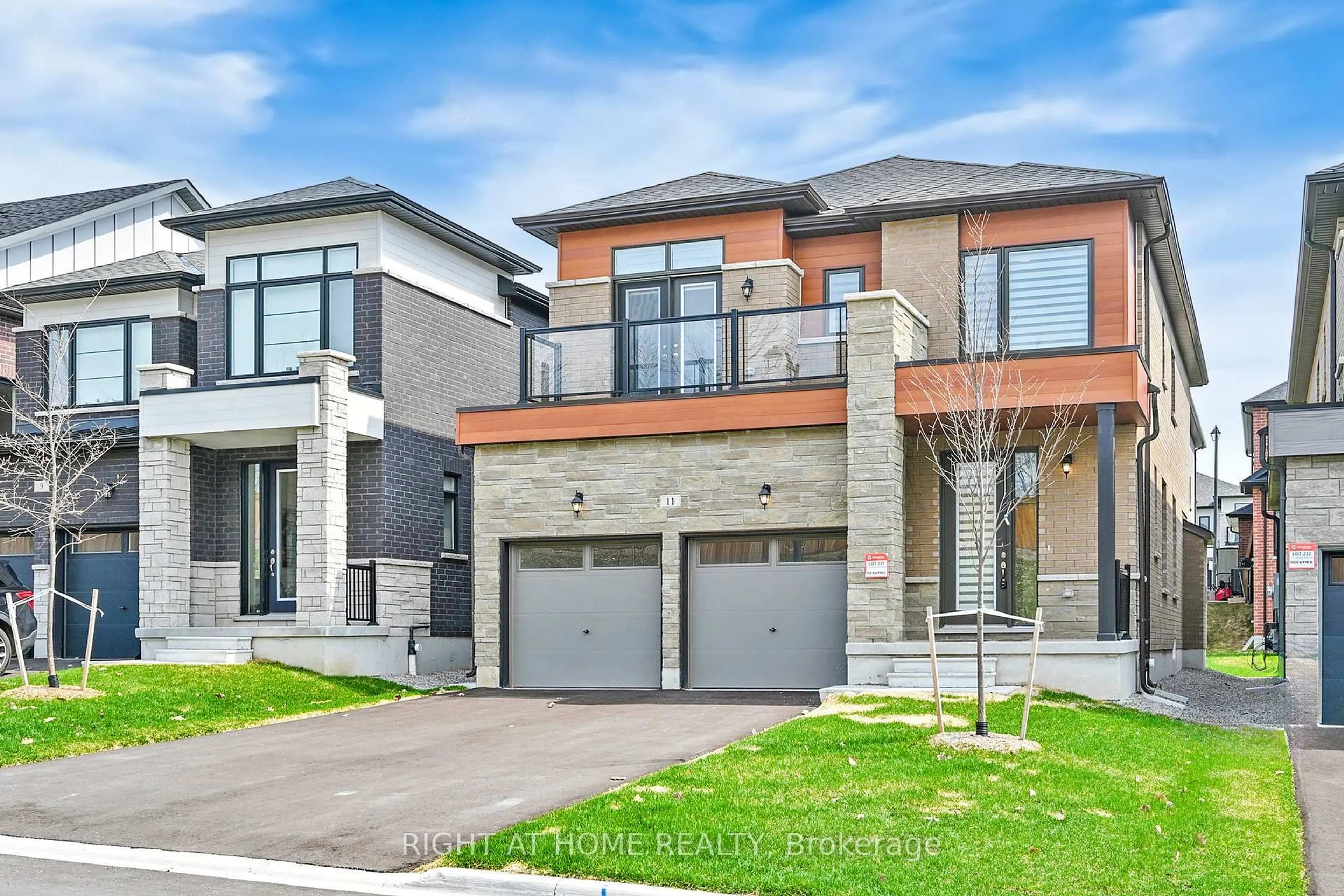 Home with brick exterior material, street for 11 Calypso Ave, Springwater Ontario L9X 2E1