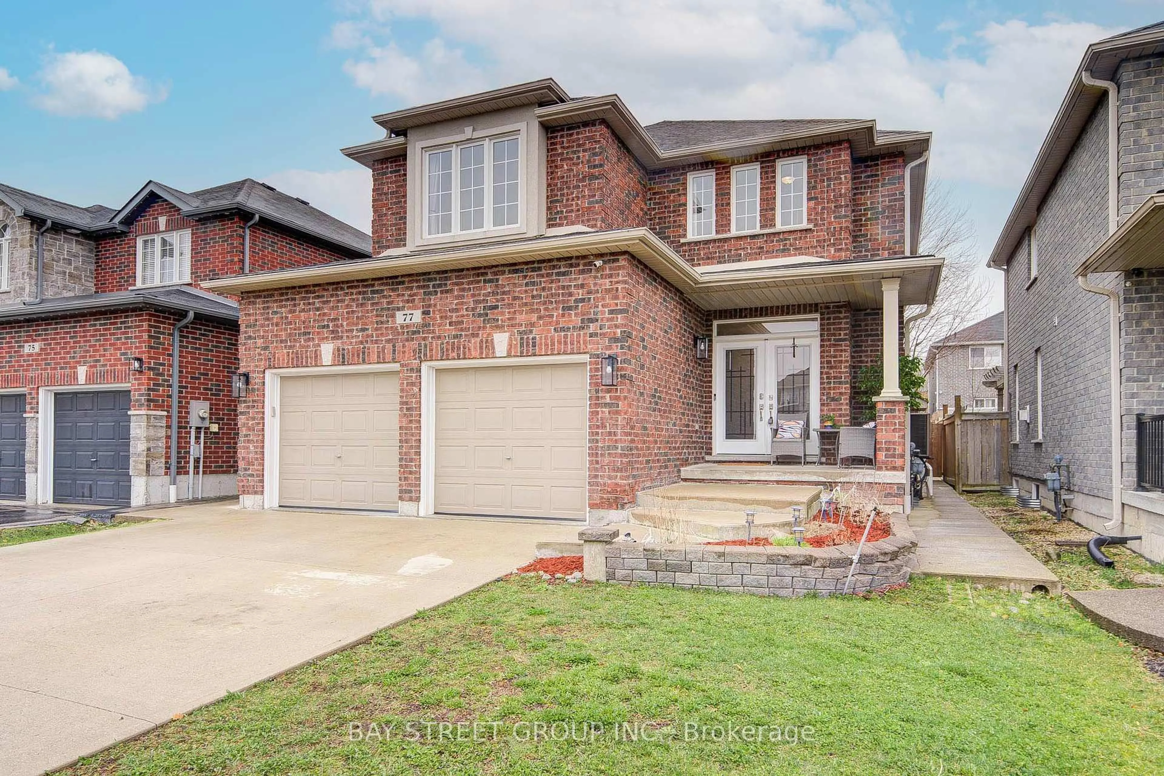 Home with brick exterior material, street for 77 Graihawk Dr, Barrie Ontario L4N 6G7
