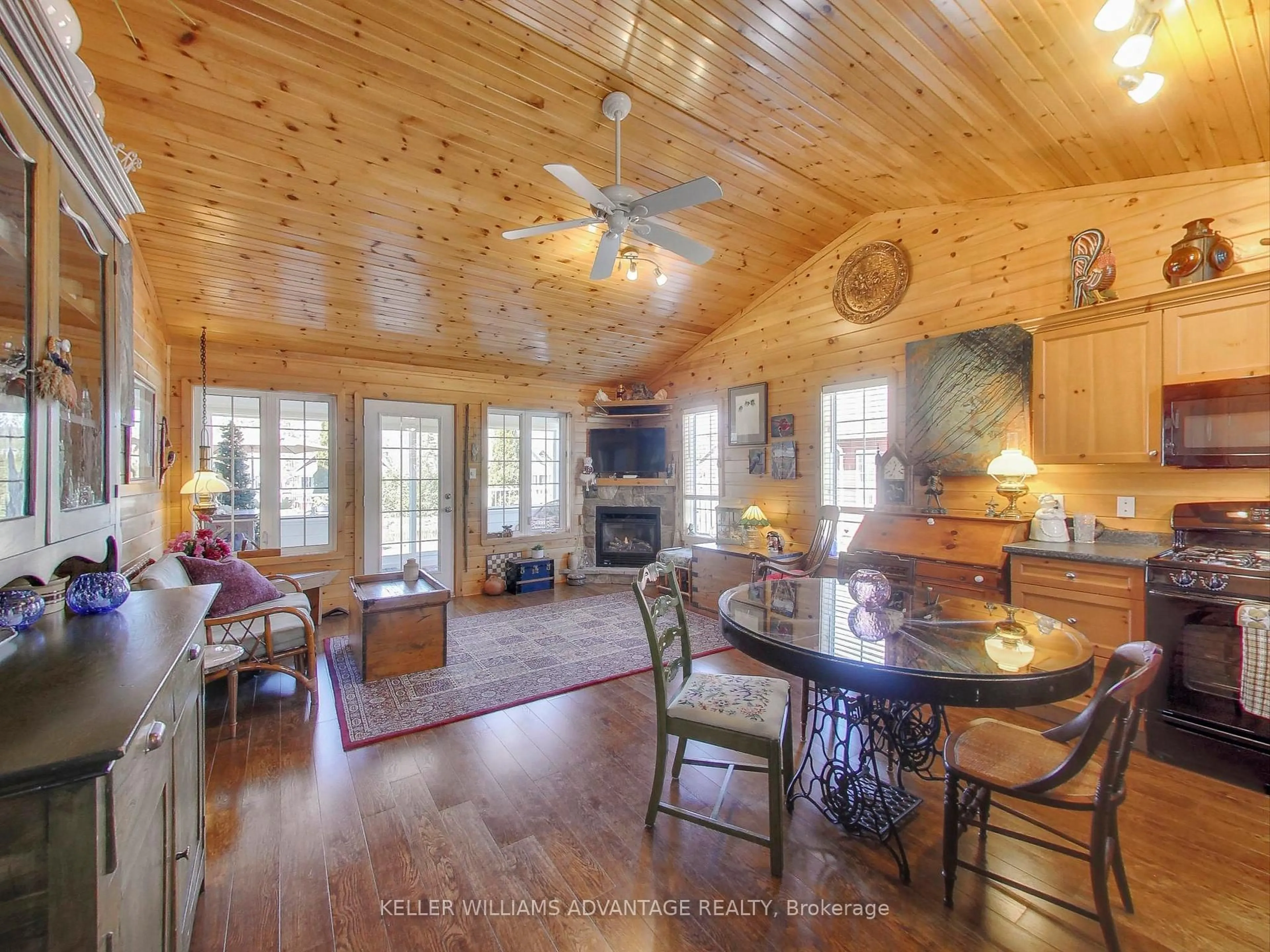 Dining room, wood/laminate floor for 48 Madawaska Tr, Wasaga Beach Ontario L9Z 1X7