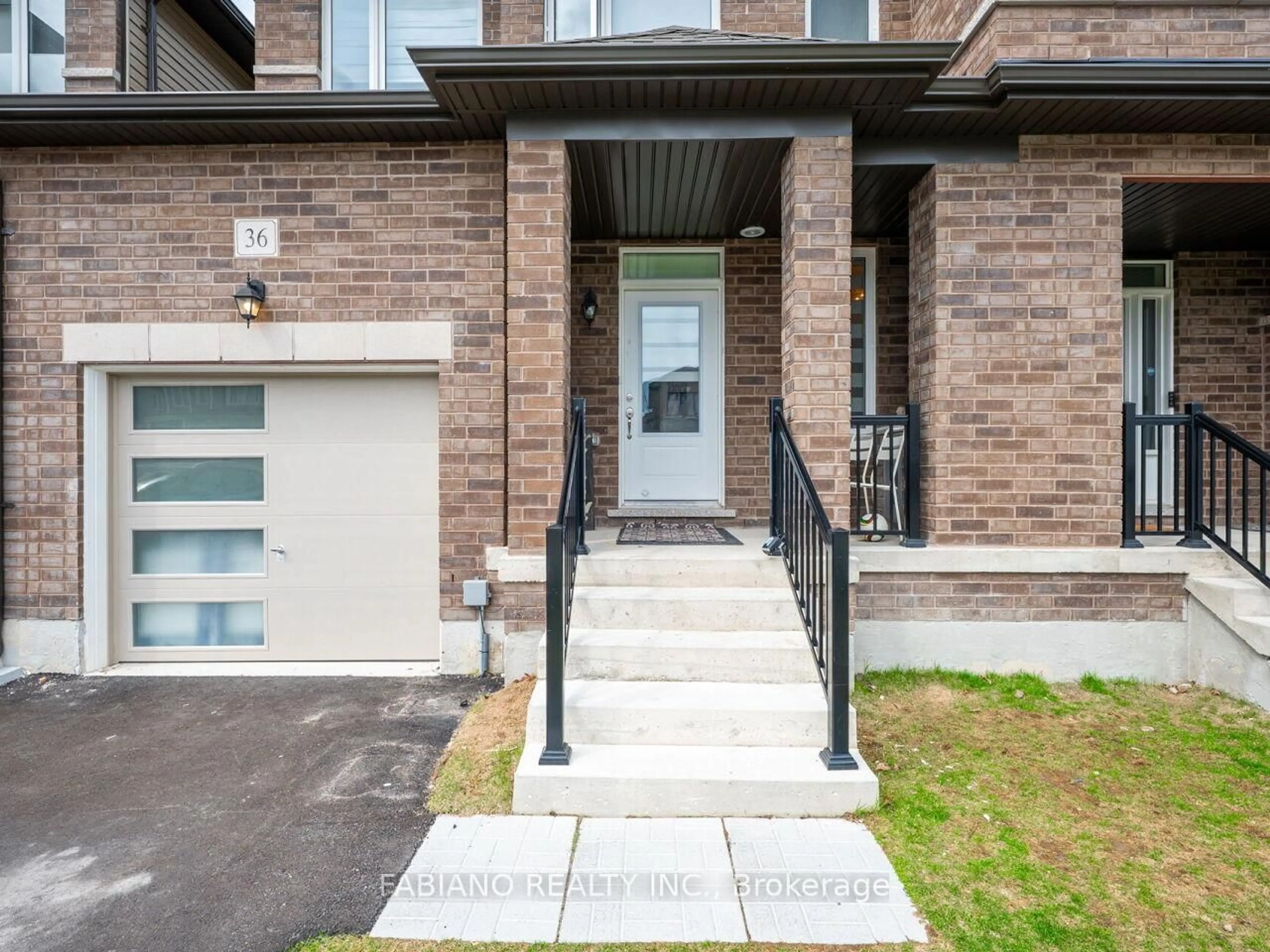 Home with brick exterior material, street for 36 Autumn Dr, Wasaga Beach Ontario L9Z 0K7