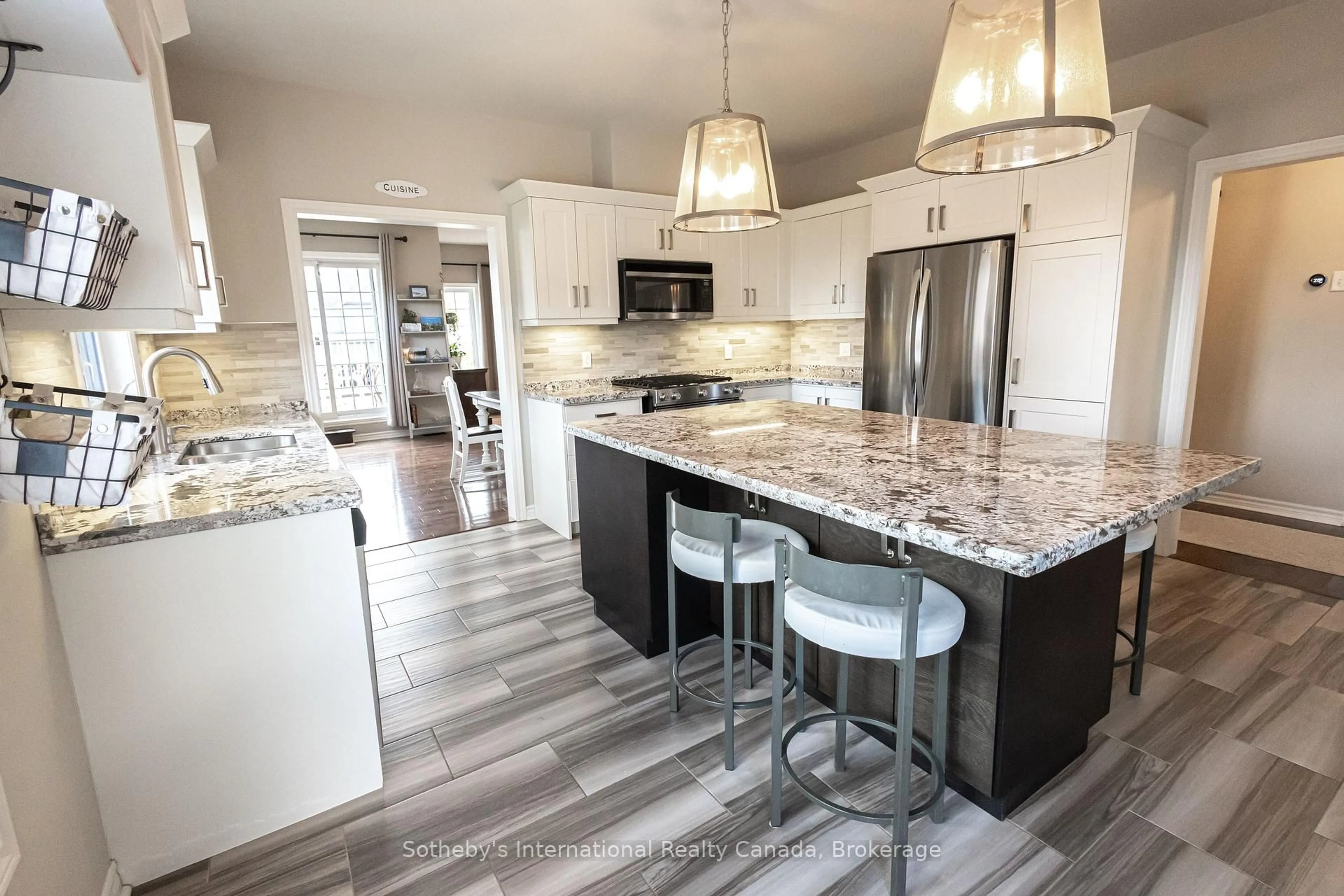 Open concept kitchen, ceramic/tile floor for 17 MAIR MILLS Dr, Collingwood Ontario L9Y 0A7