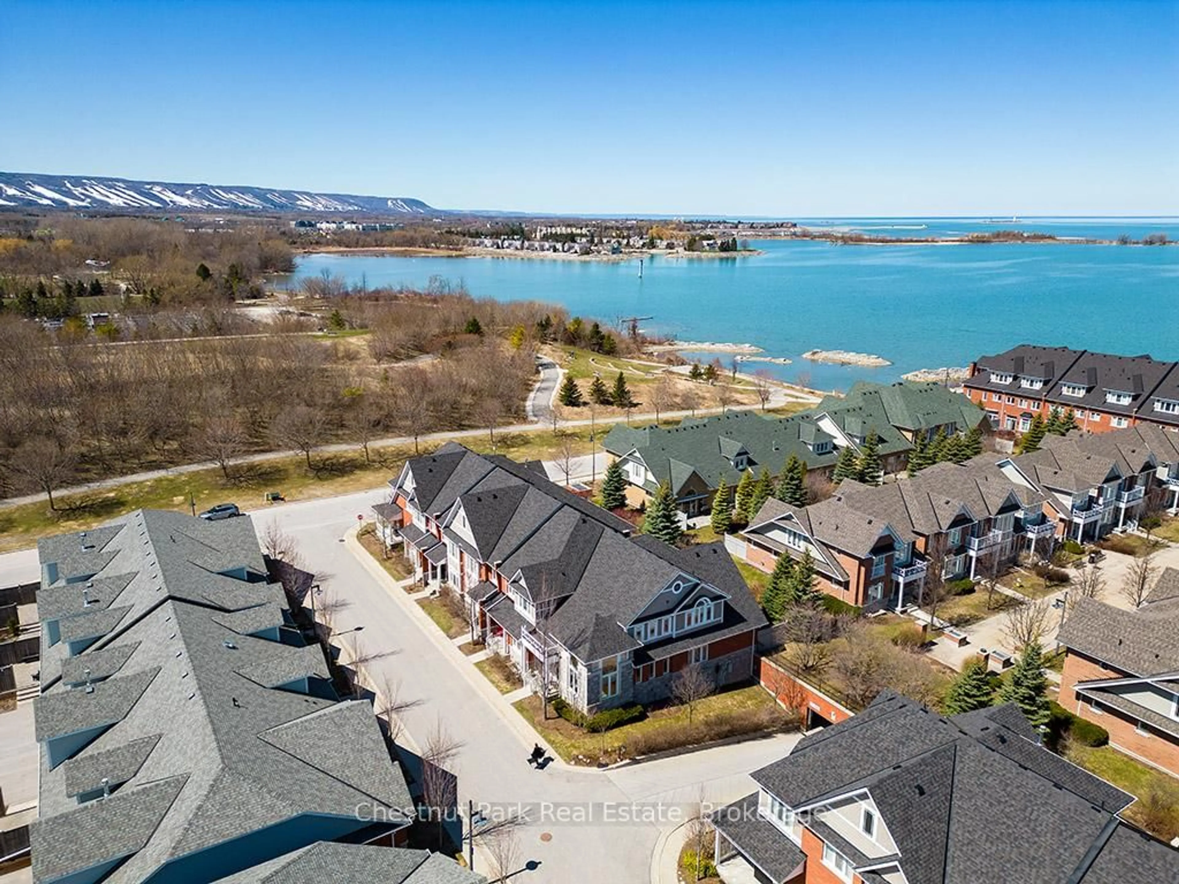 A pic from outside/outdoor area/front of a property/back of a property/a pic from drone, water/lake/river/ocean view for 13 Collship Lane, Collingwood Ontario L9Y 0J6