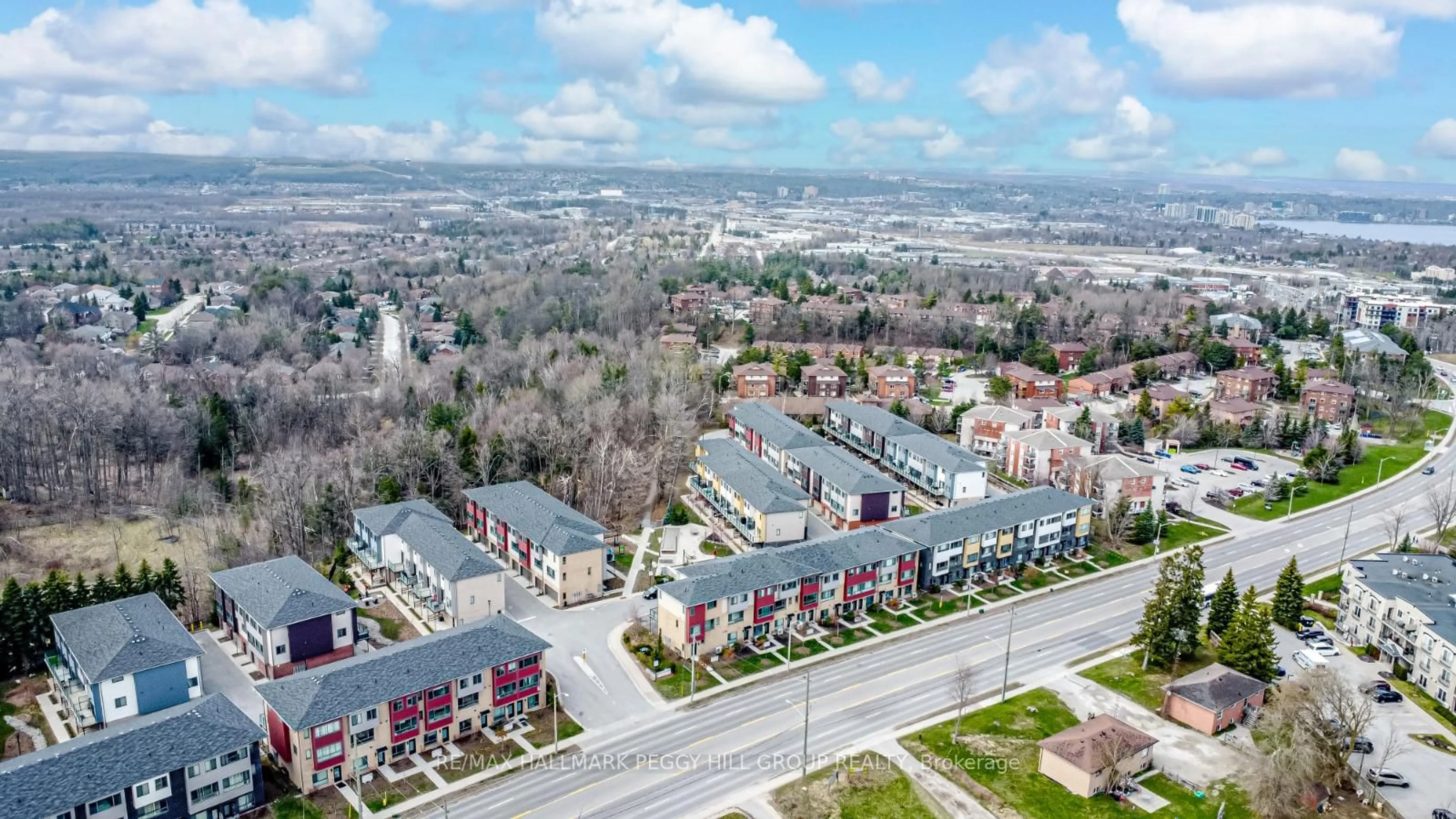 A pic from outside/outdoor area/front of a property/back of a property/a pic from drone, unknown for 369 Essa Rd #14, Barrie Ontario L4N 9C8