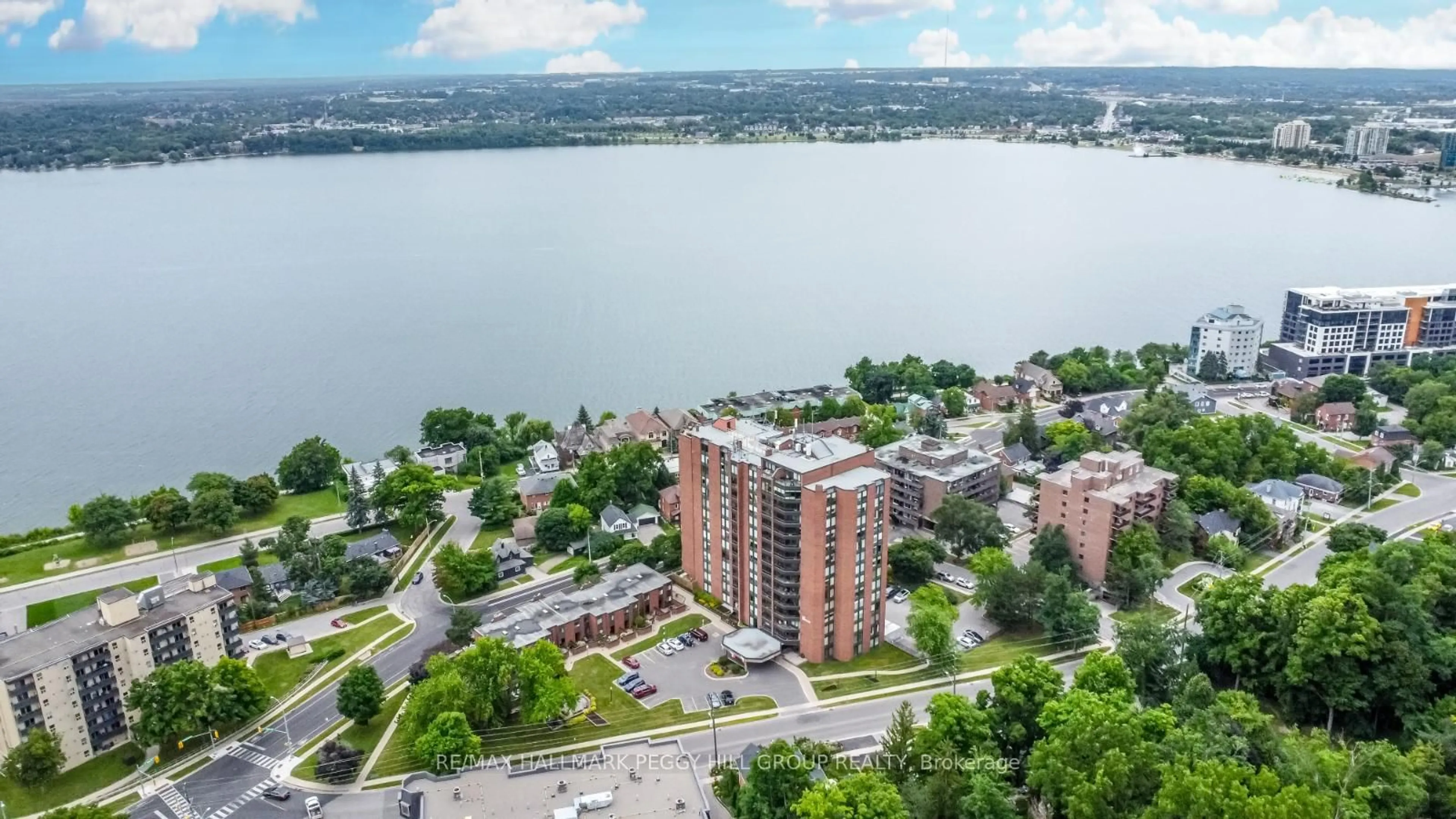 A pic from outside/outdoor area/front of a property/back of a property/a pic from drone, water/lake/river/ocean view for 181 Collier St #206, Barrie Ontario L4M 5L6