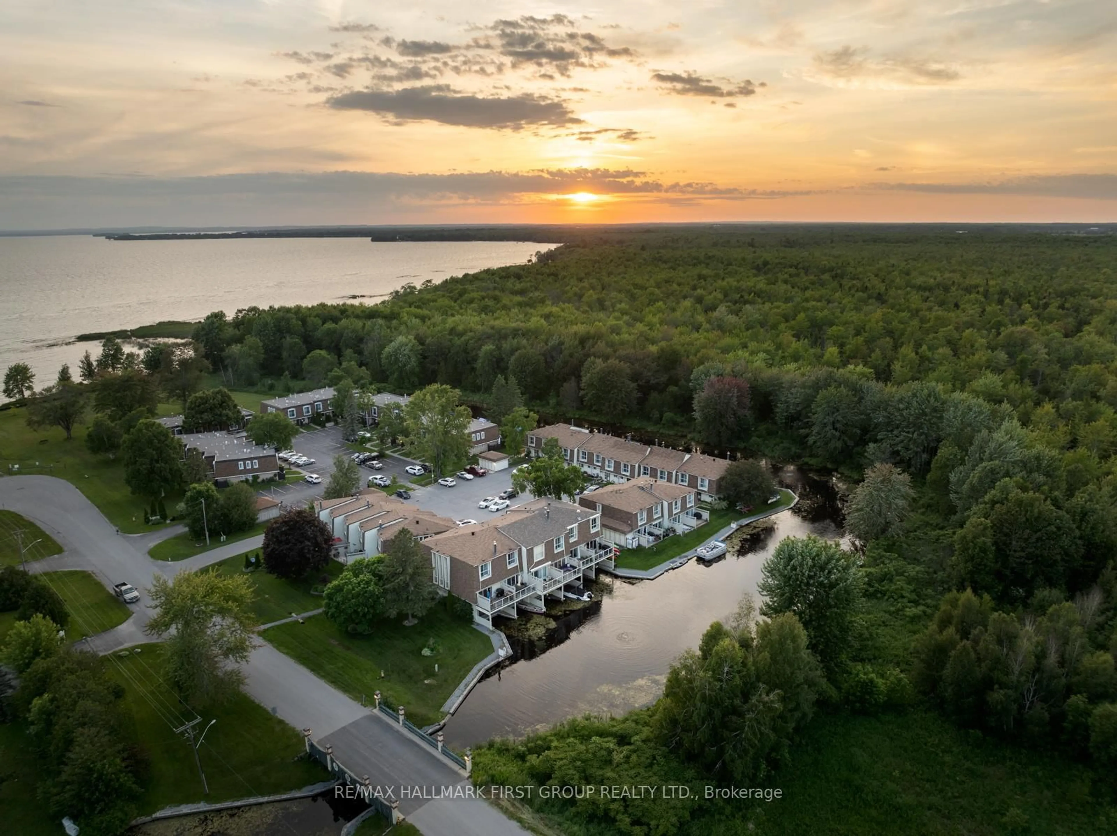 A pic from outside/outdoor area/front of a property/back of a property/a pic from drone, water/lake/river/ocean view for 4 Paradise Blvd #9, Ramara Ontario L0K 1B0