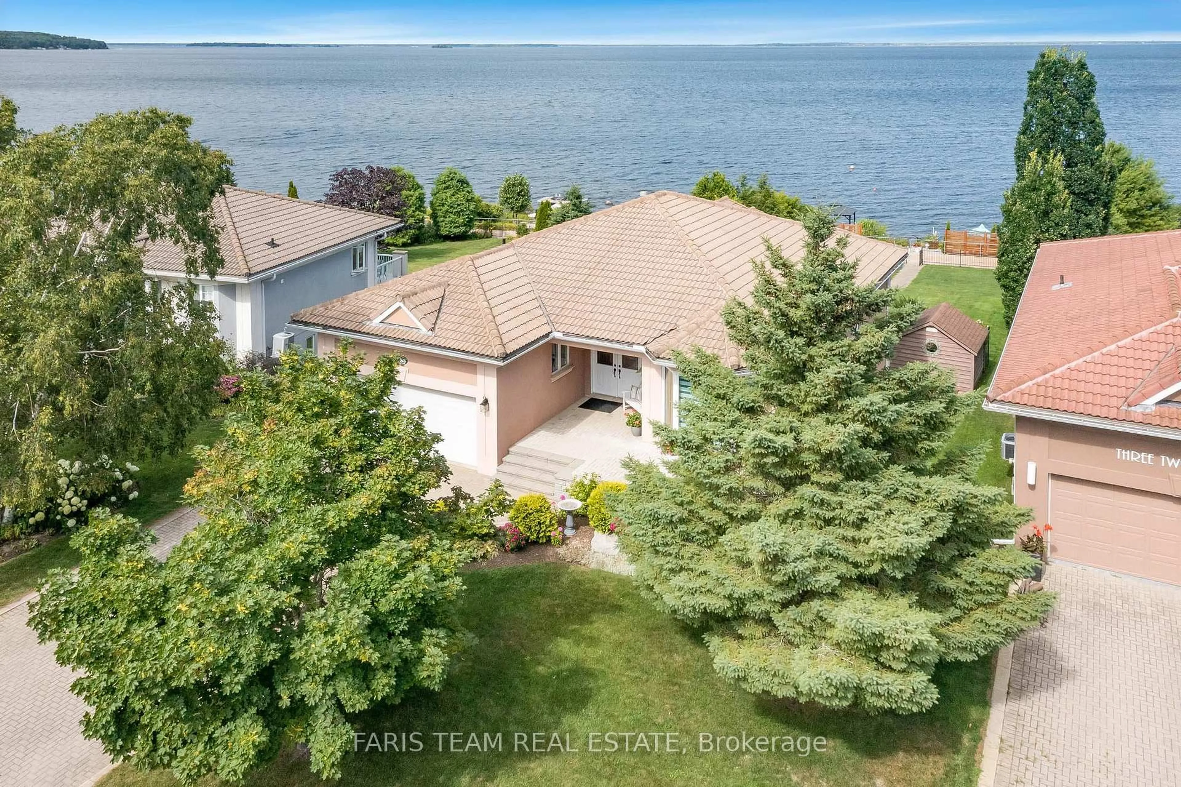 A pic from outside/outdoor area/front of a property/back of a property/a pic from drone, water/lake/river/ocean view for 325 Aberdeen Blvd, Midland Ontario L4R 5M9