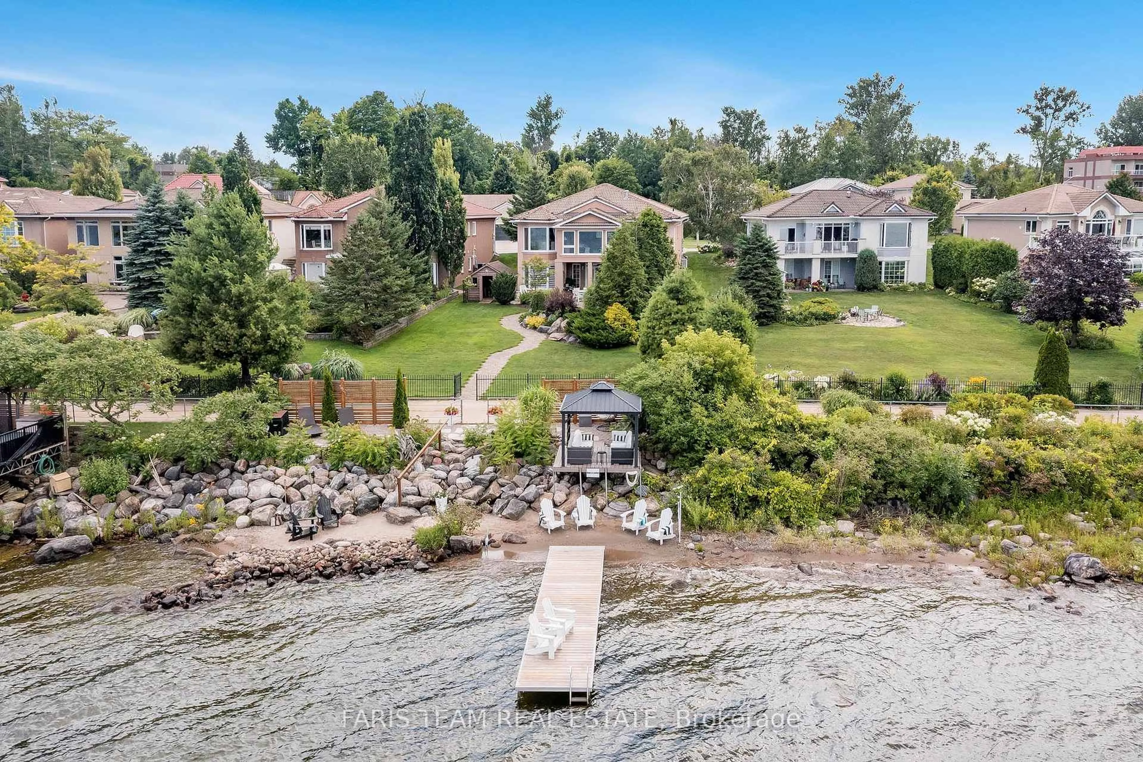 A pic from outside/outdoor area/front of a property/back of a property/a pic from drone, water/lake/river/ocean view for 325 Aberdeen Blvd, Midland Ontario L4R 5M9