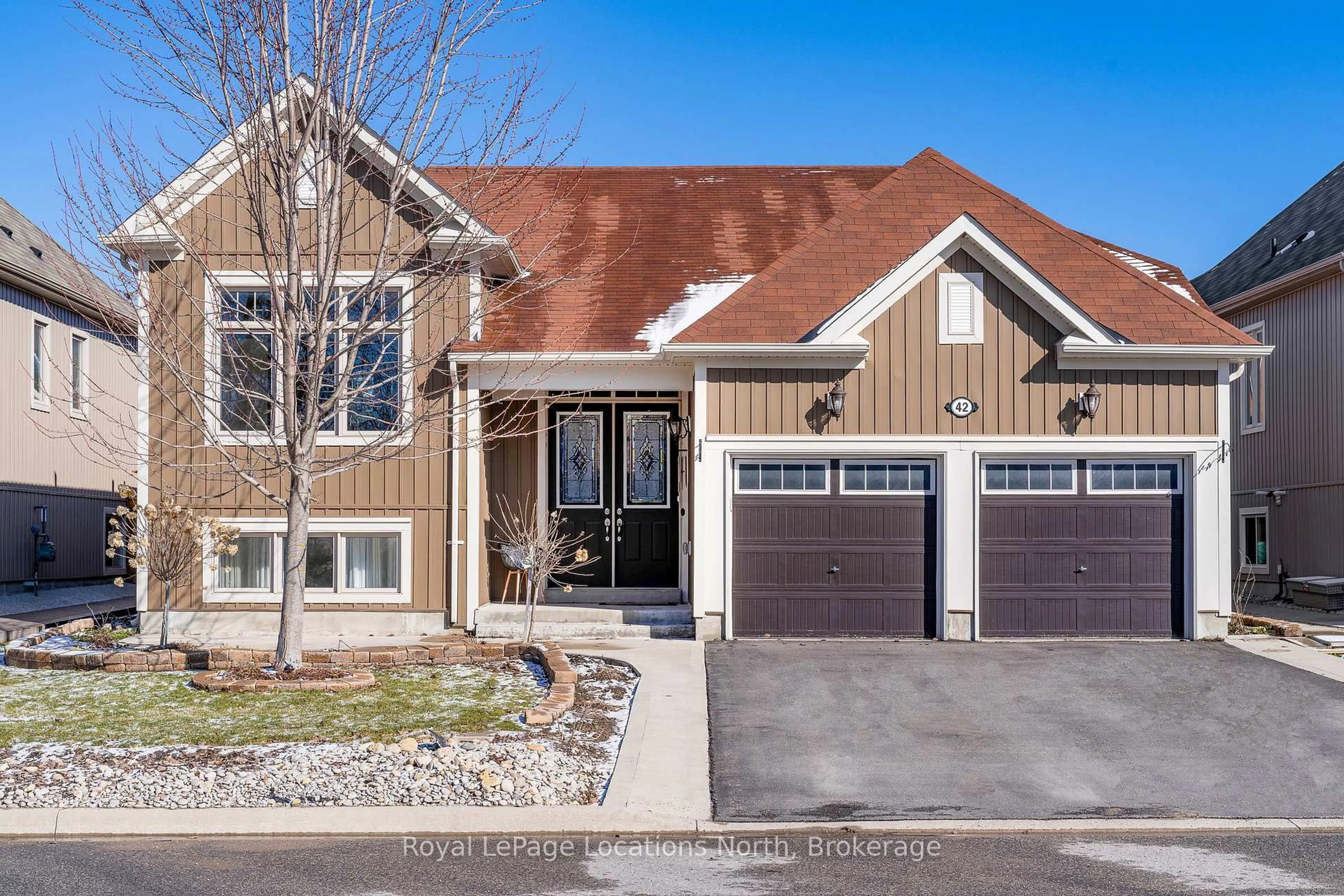 Home with brick exterior material, street for 42 Cristiano Ave, Wasaga Beach Ontario L9Z 0H2