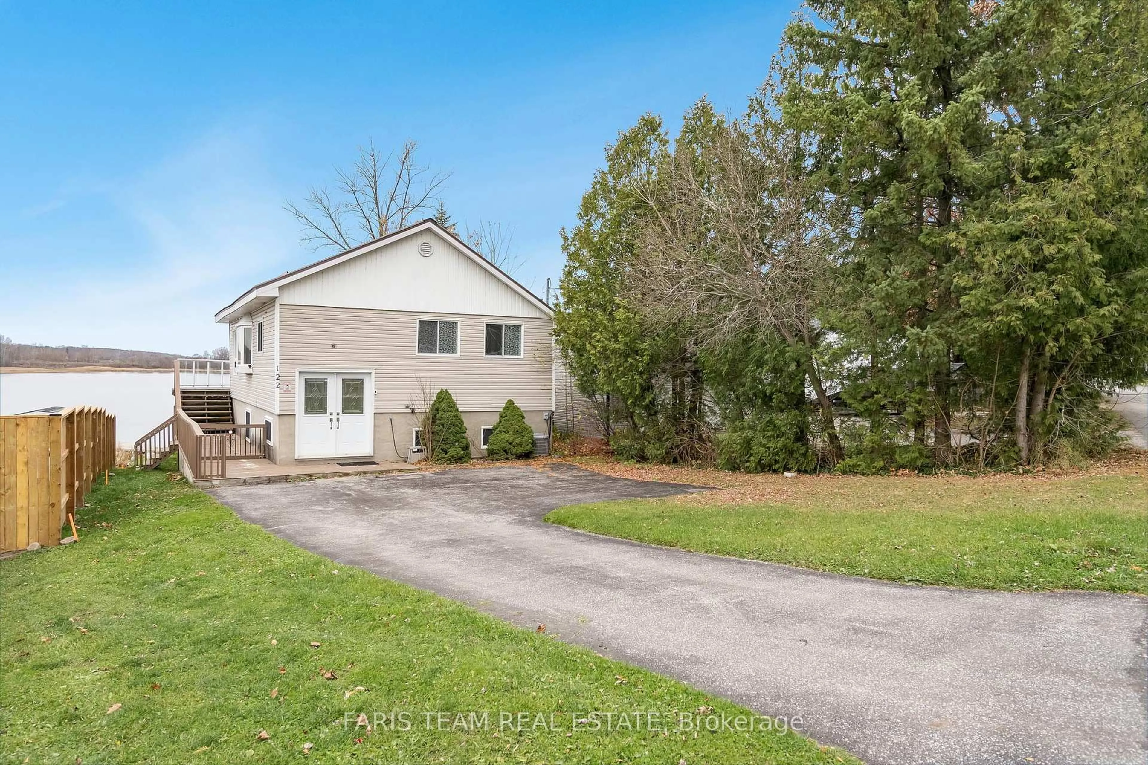 A pic from outside/outdoor area/front of a property/back of a property/a pic from drone, street for 122 Mitchells Beach Rd, Tay Ontario L0K 2A0