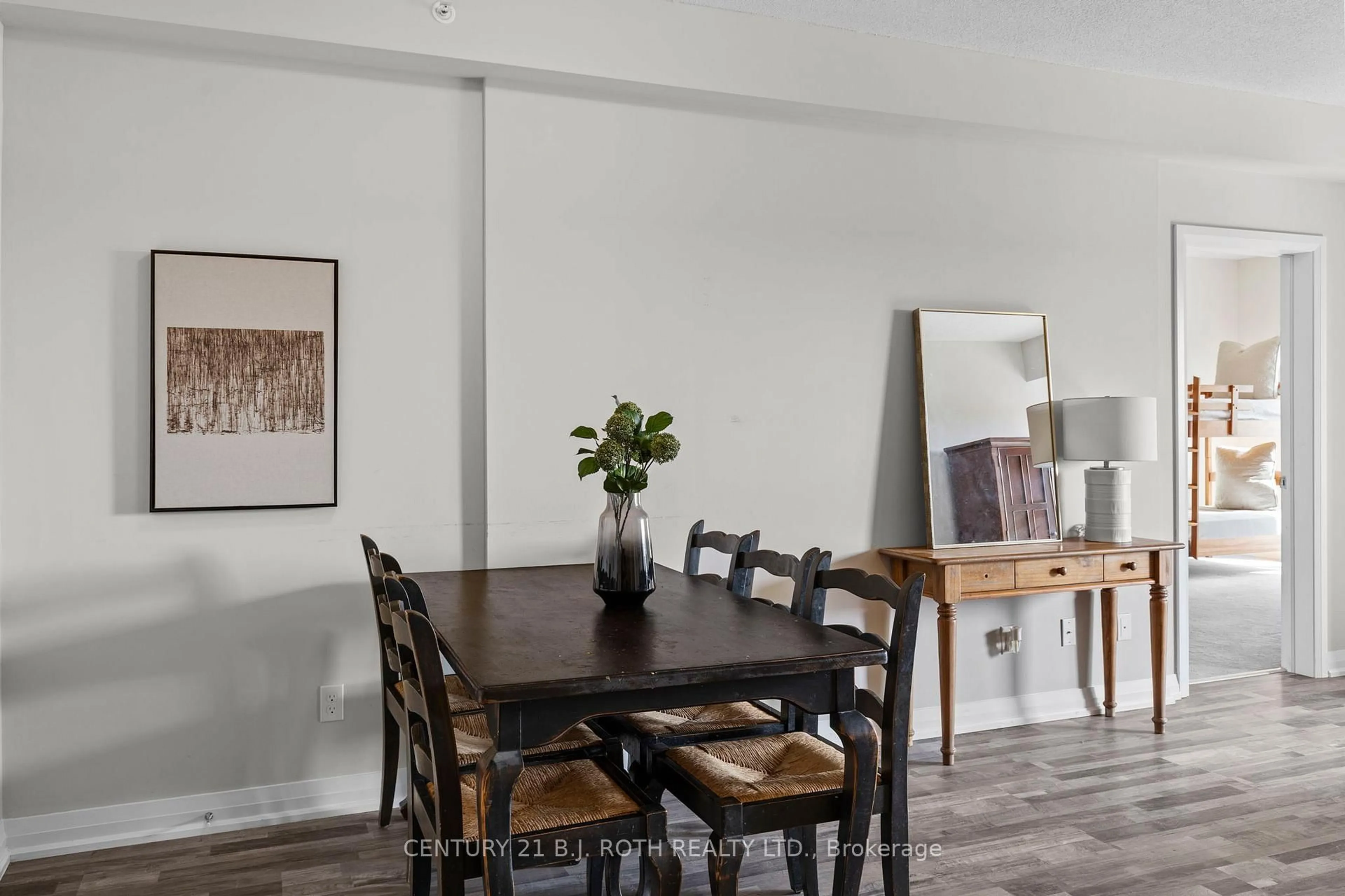 Dining room, wood/laminate floor for 54 KODA St #409, Barrie Ontario L9J 0J6
